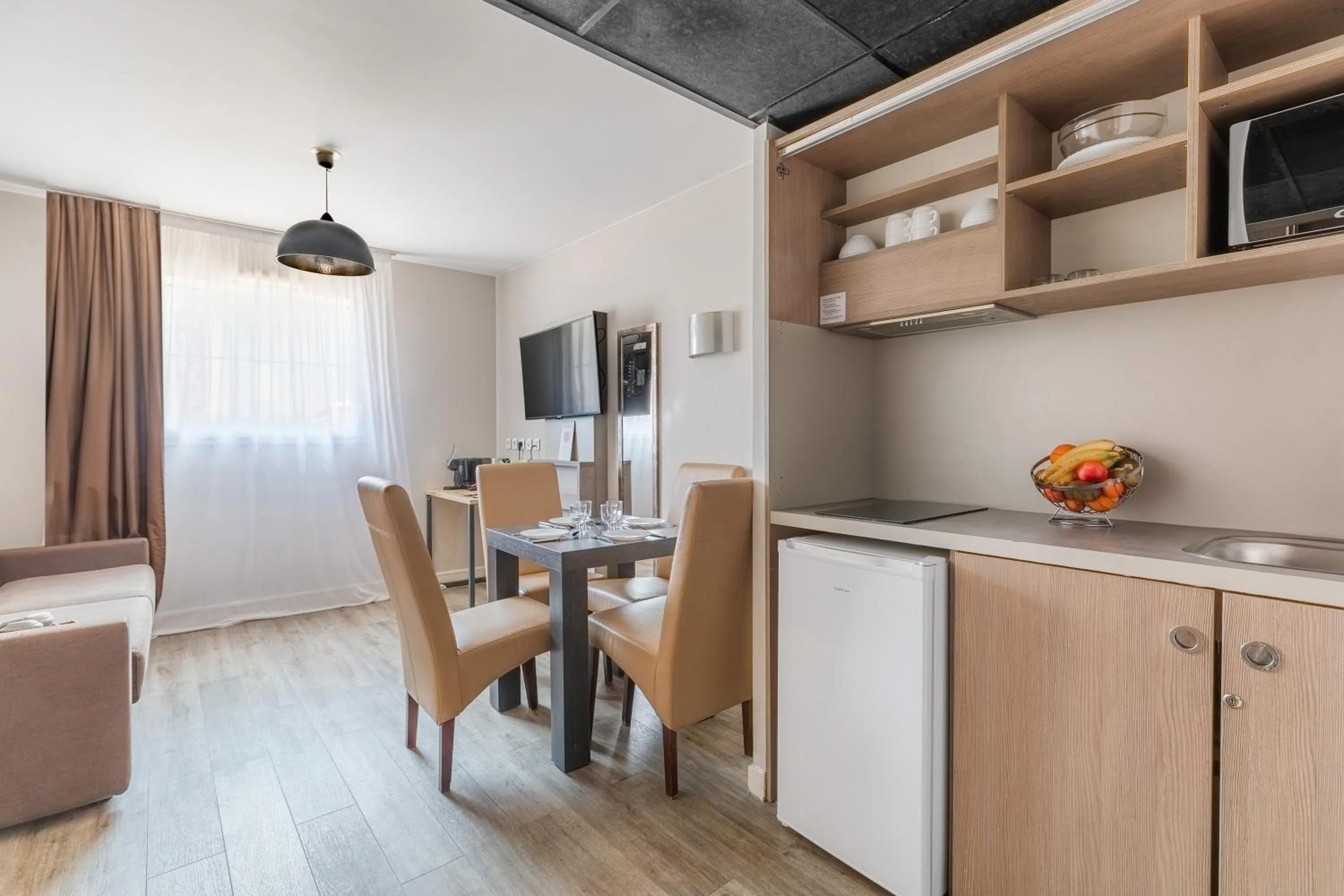 TV and multimedia in Appart'City Confort Marseille Centre Prado Vélodrome