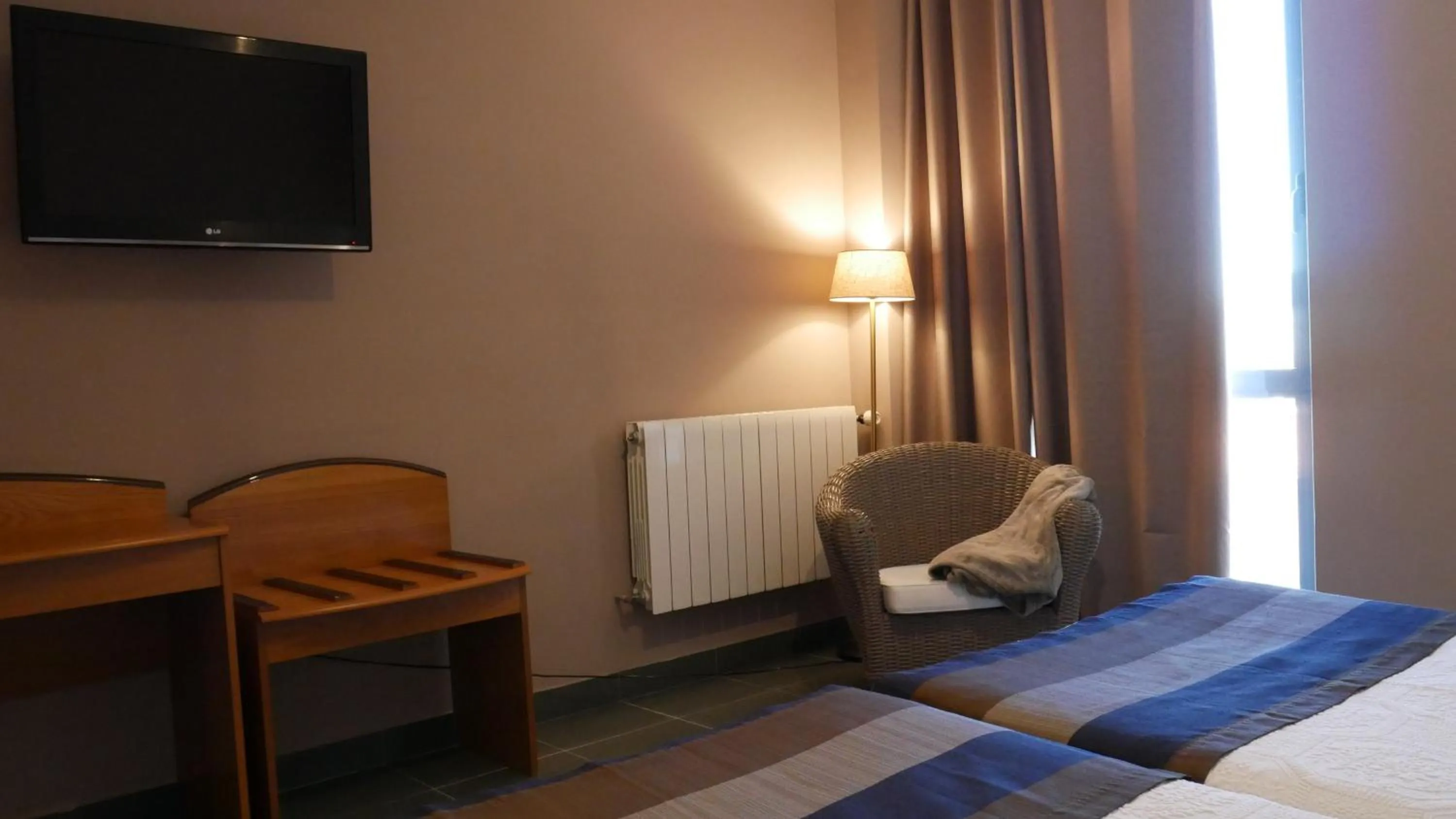 Bed in Hotel Escuela San Cristobal