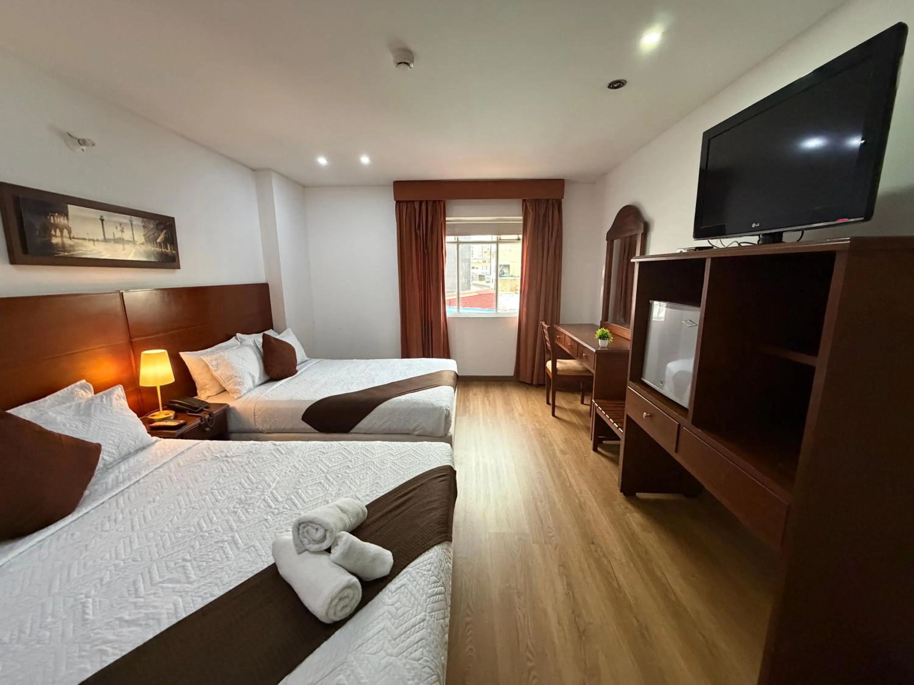 Bed in Blu Inn Hotel