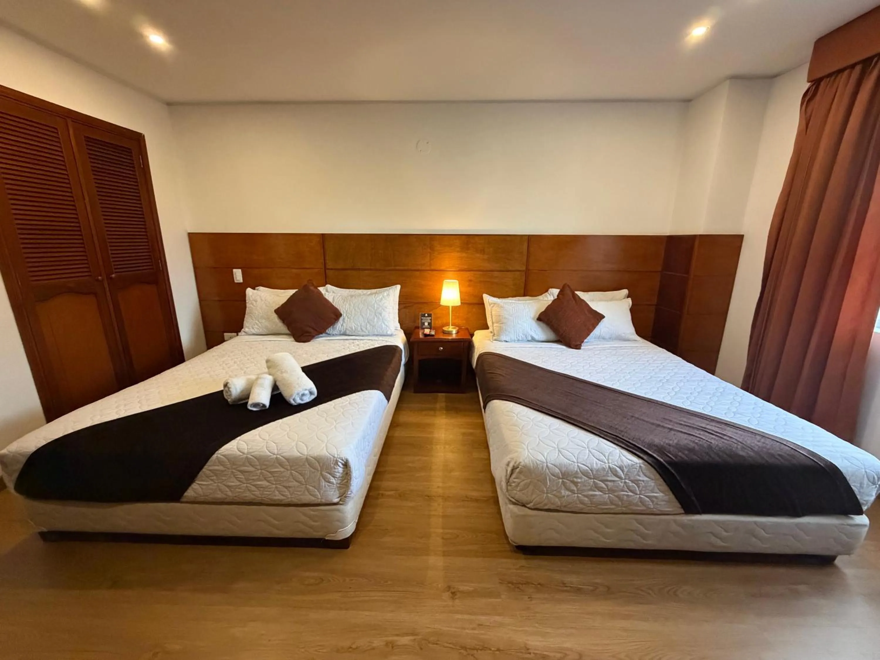 Bed in Blu Inn Hotel