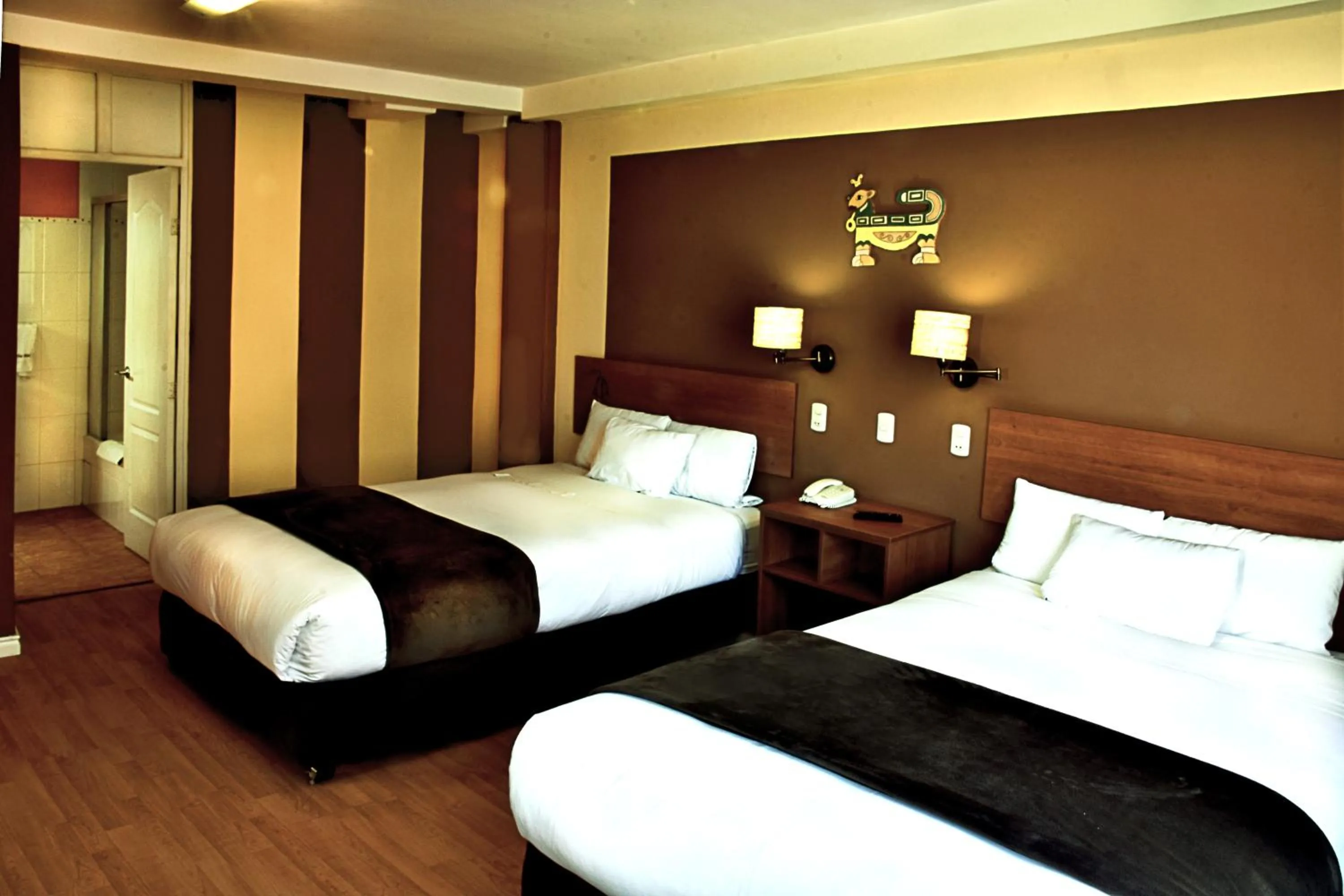Photo of the whole room, Bed in Intiqa Hotel
