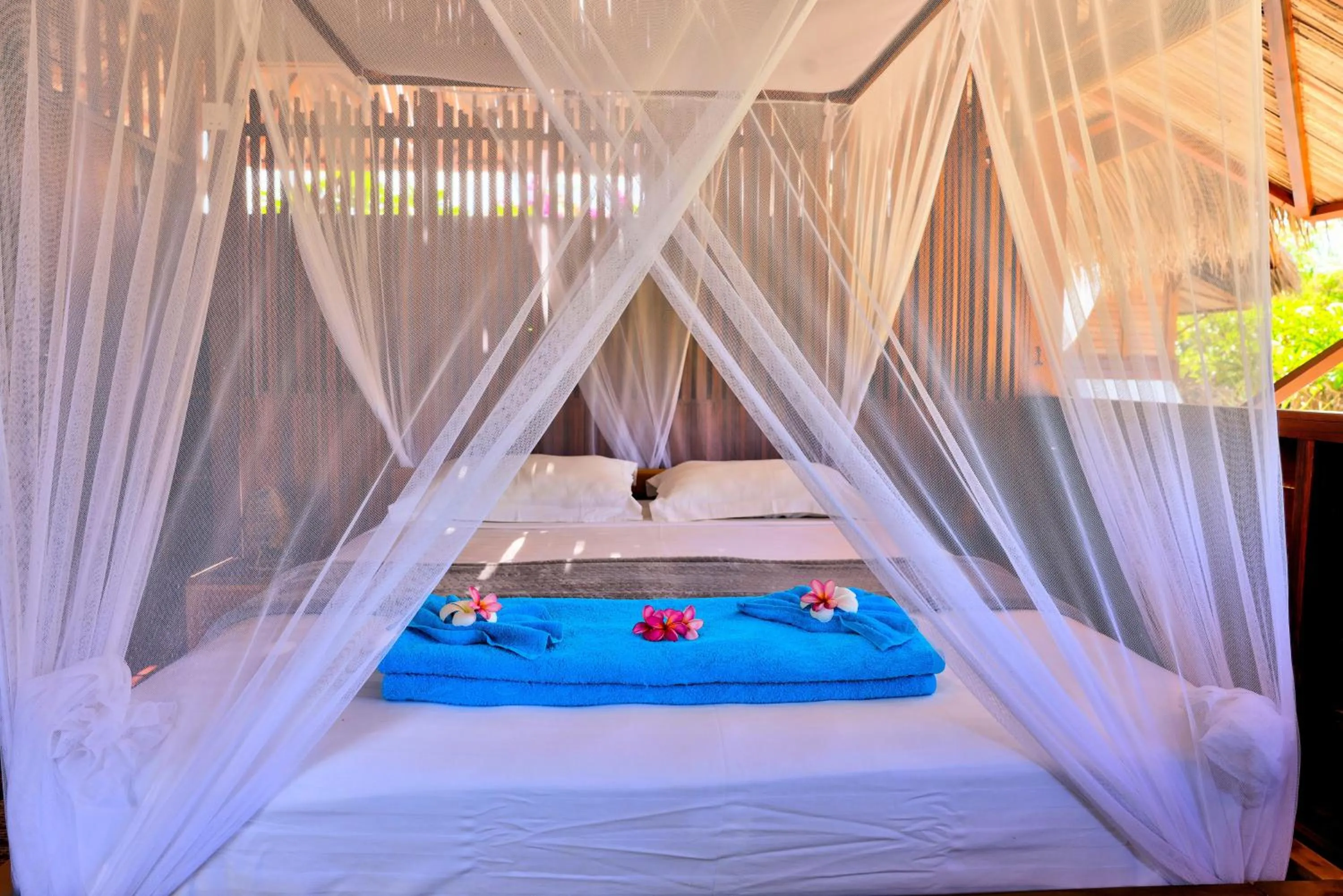 Bed in Loedi Bungalows Rote