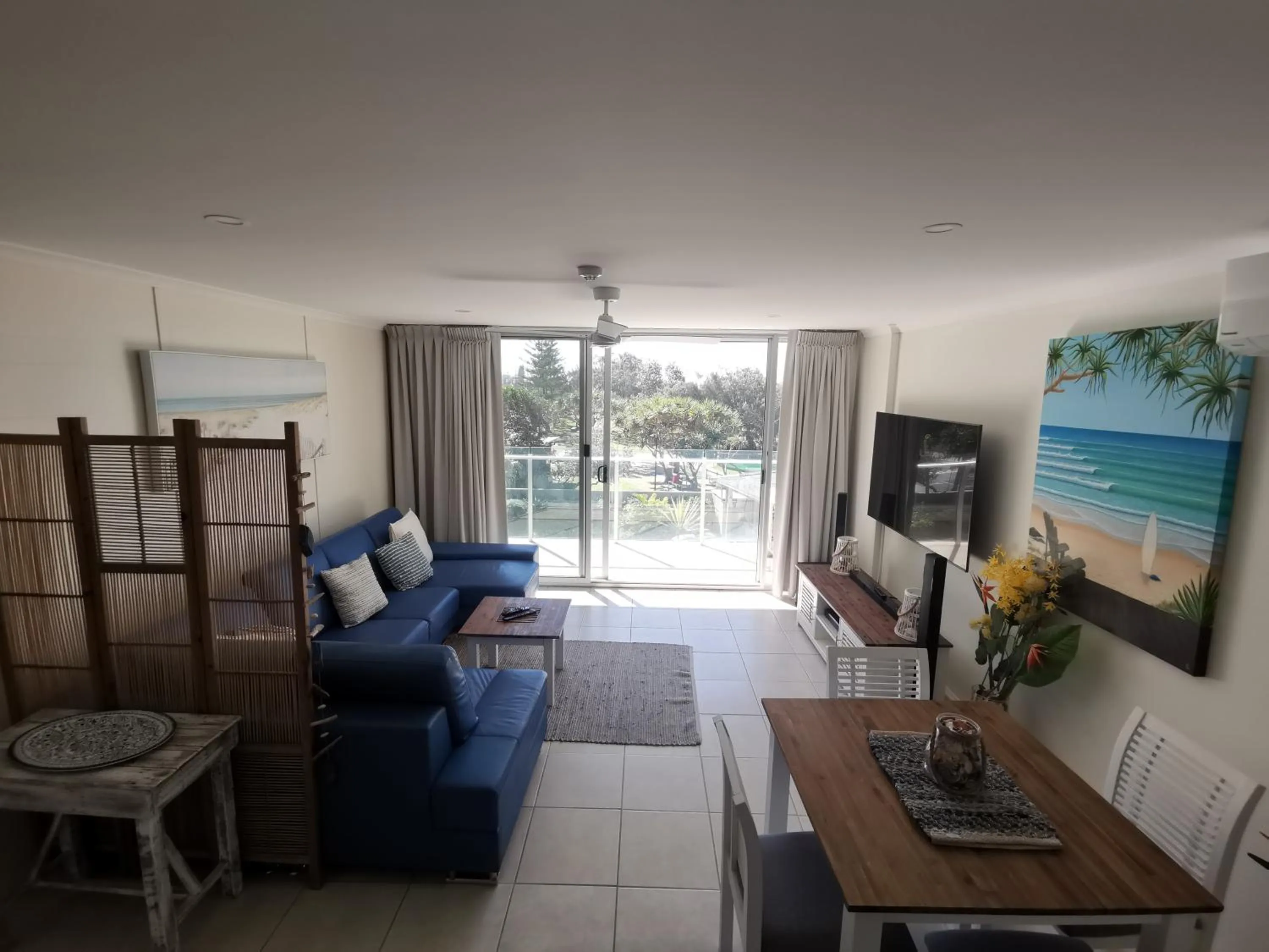 Communal lounge/ TV room in One The Esplanade Apartments on Surfers Paradise