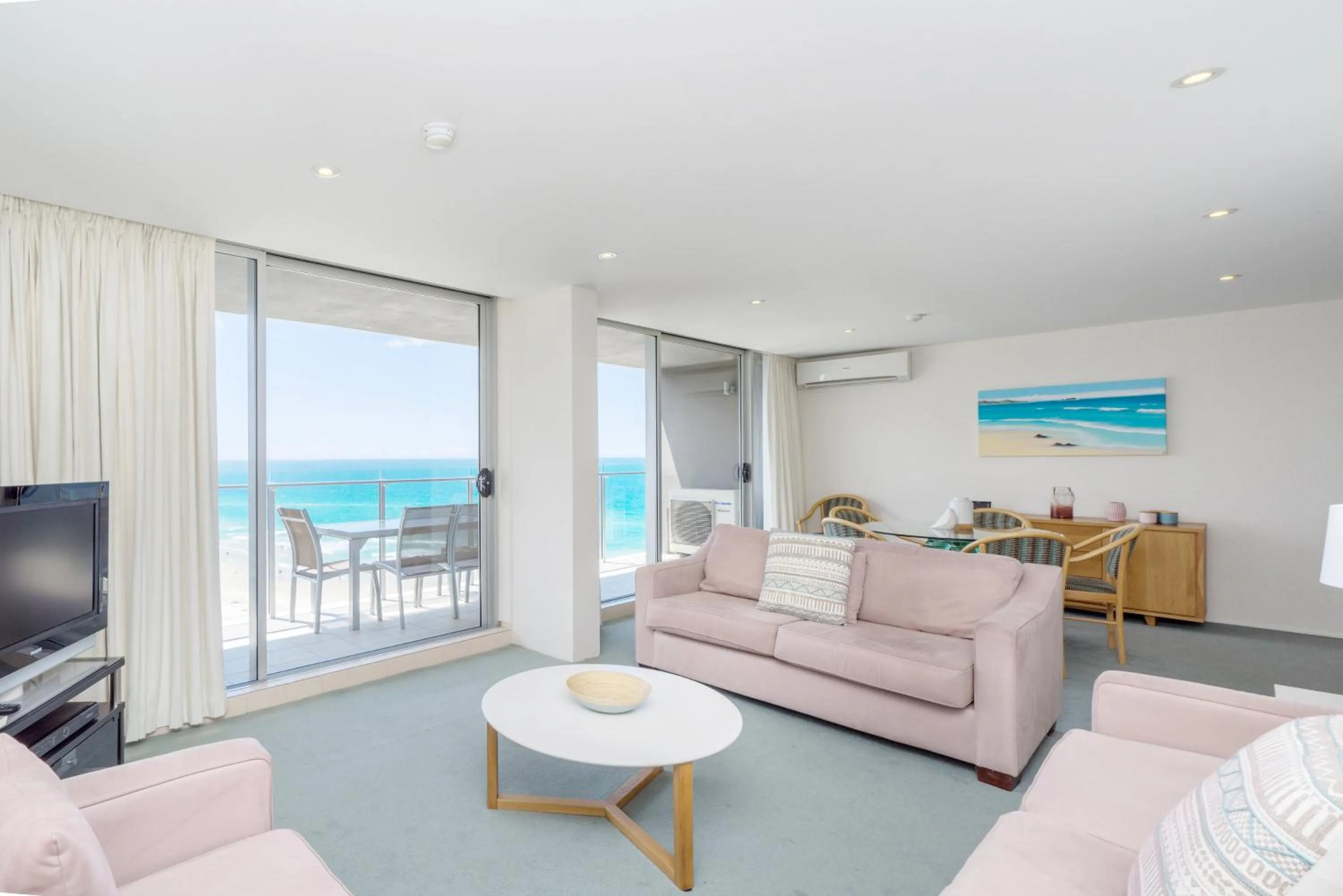 Communal lounge/ TV room in One The Esplanade Apartments on Surfers Paradise