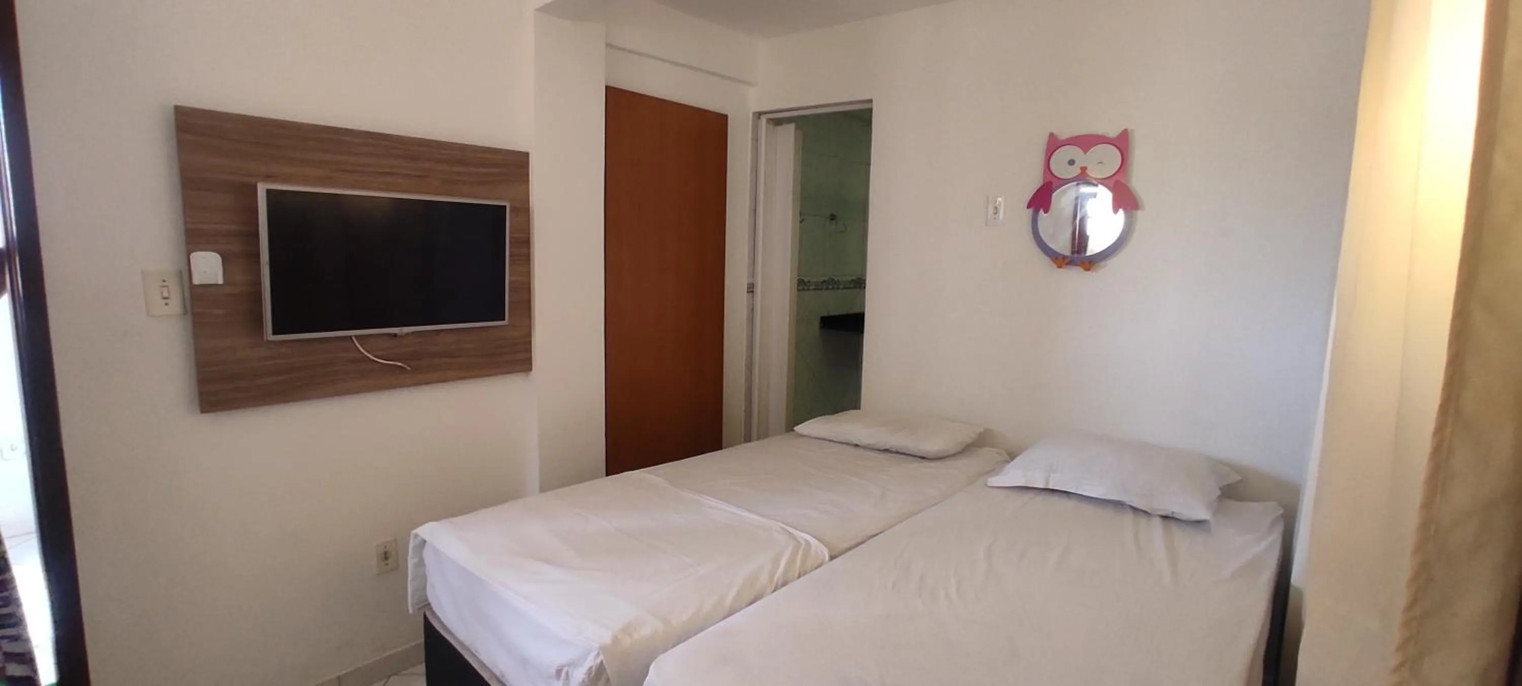 Bed in Pousada Zumbi dos Palmares