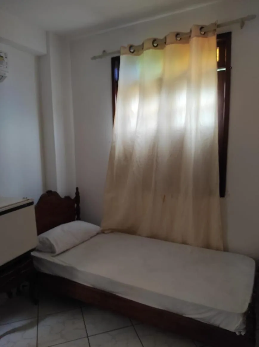 Bed in Pousada Zumbi dos Palmares