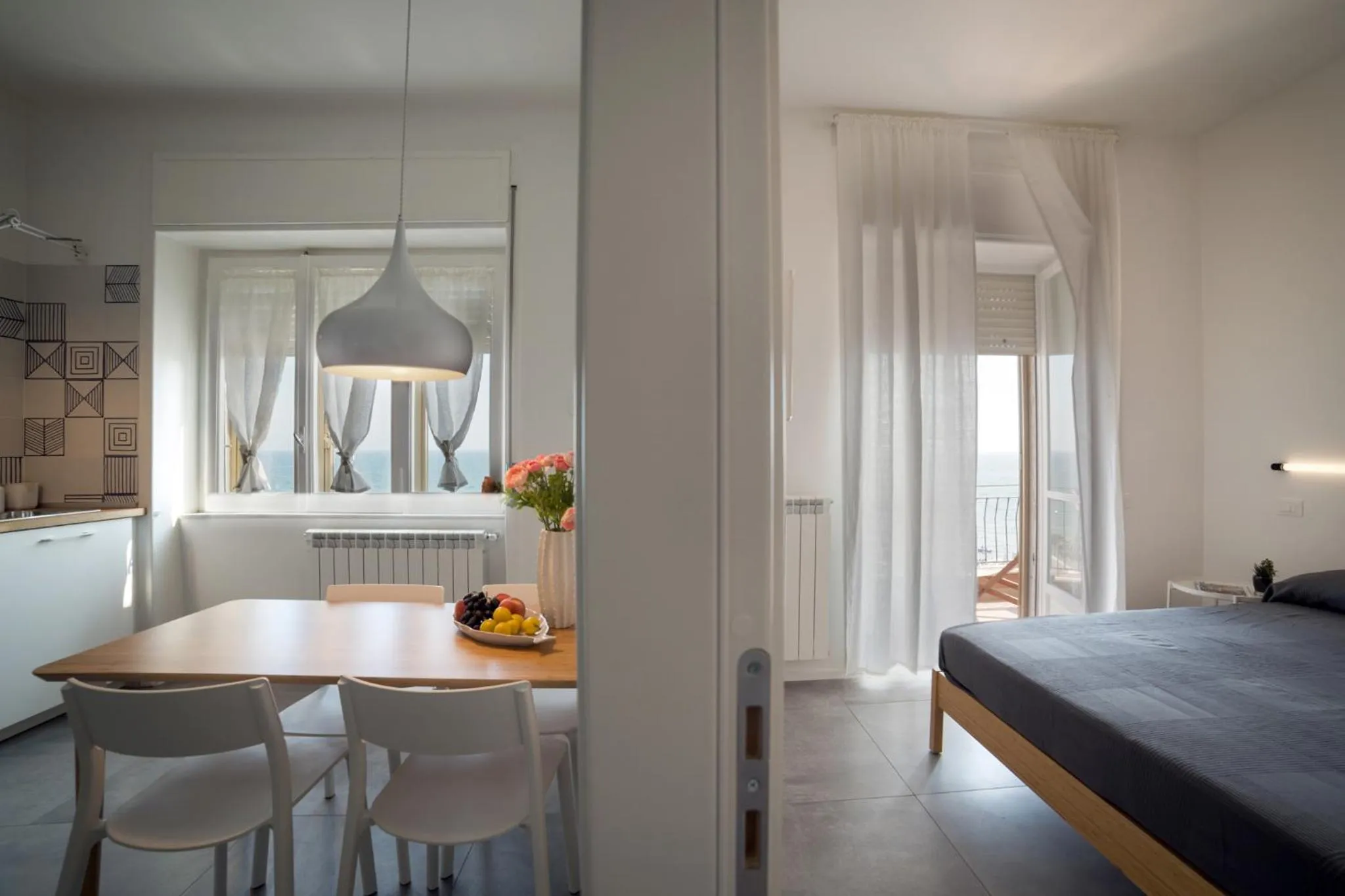 Kitchen or kitchenette, Bed in Salsedine Sea View