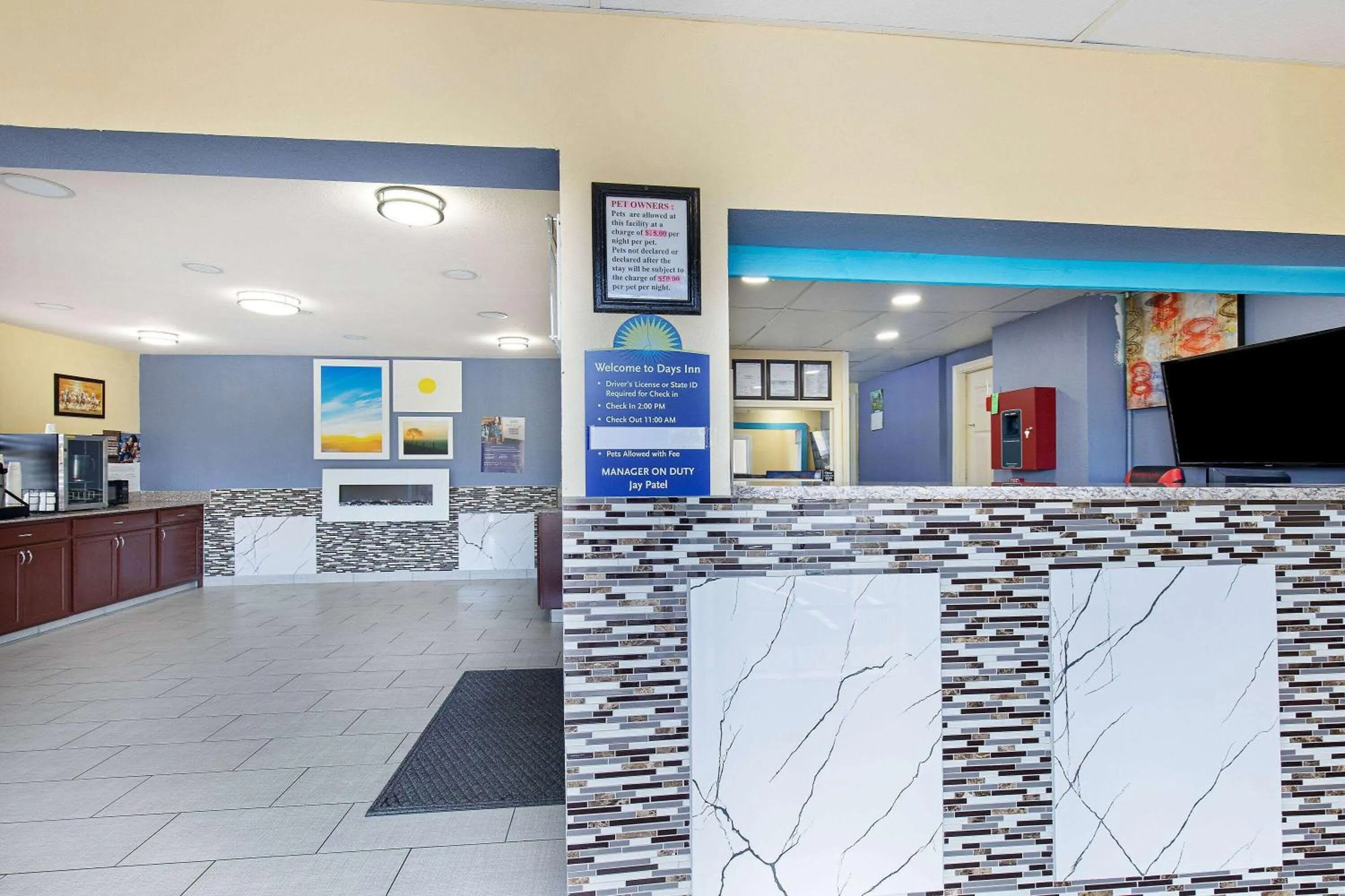 Lobby or reception in Days Inn by Wyndham Holladay