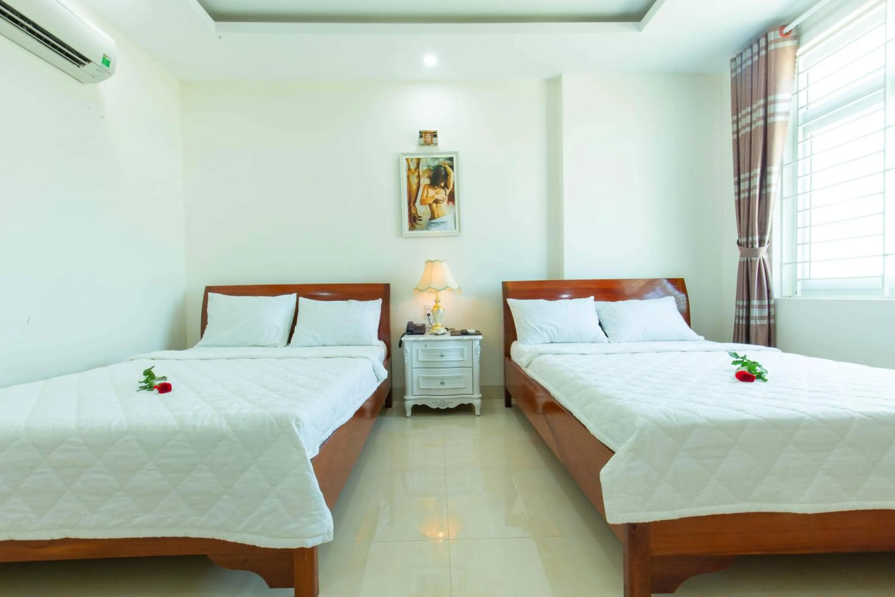 Photo of the whole room, Bed in Biển Ngọc Hotel