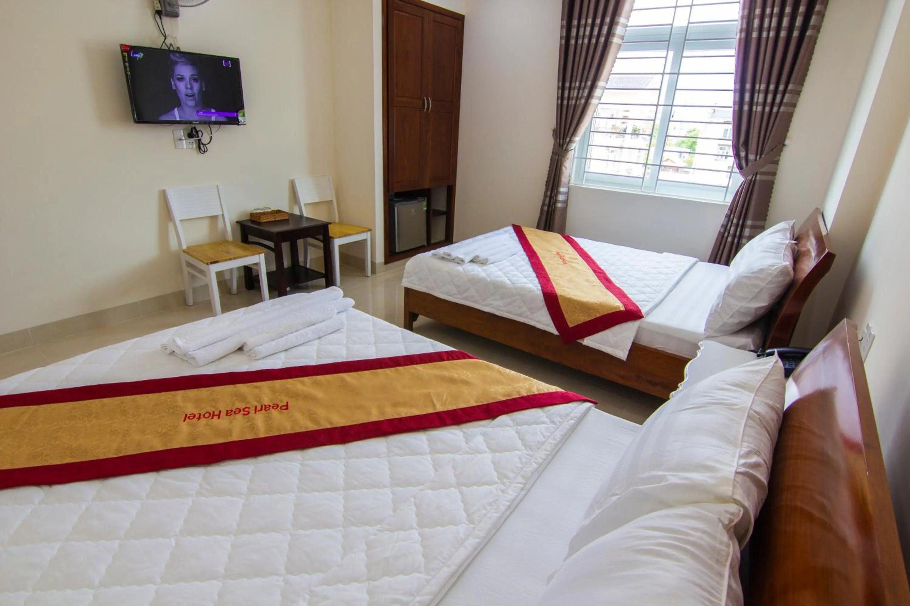 Photo of the whole room, Bed in Biển Ngọc Hotel