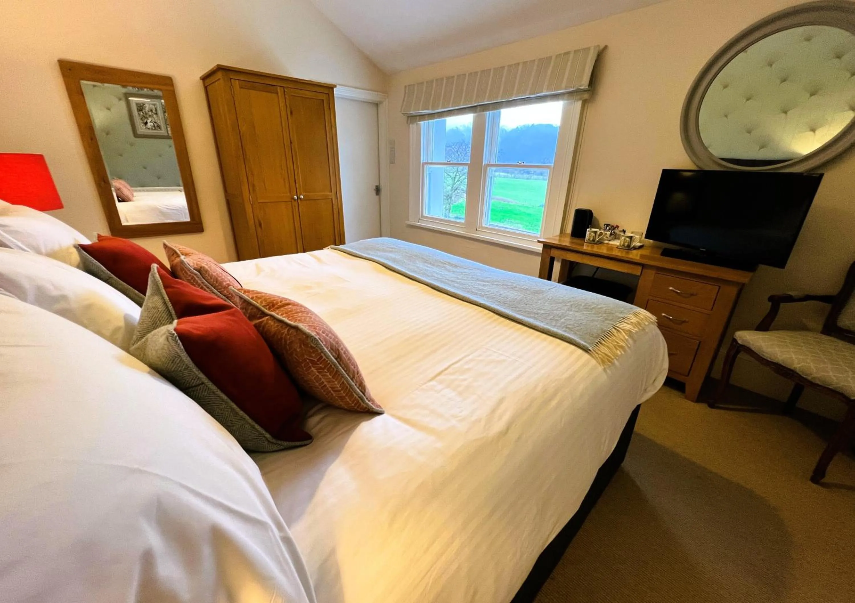 Bedroom, Bed in Ravenstone Lodge Country House Hotel