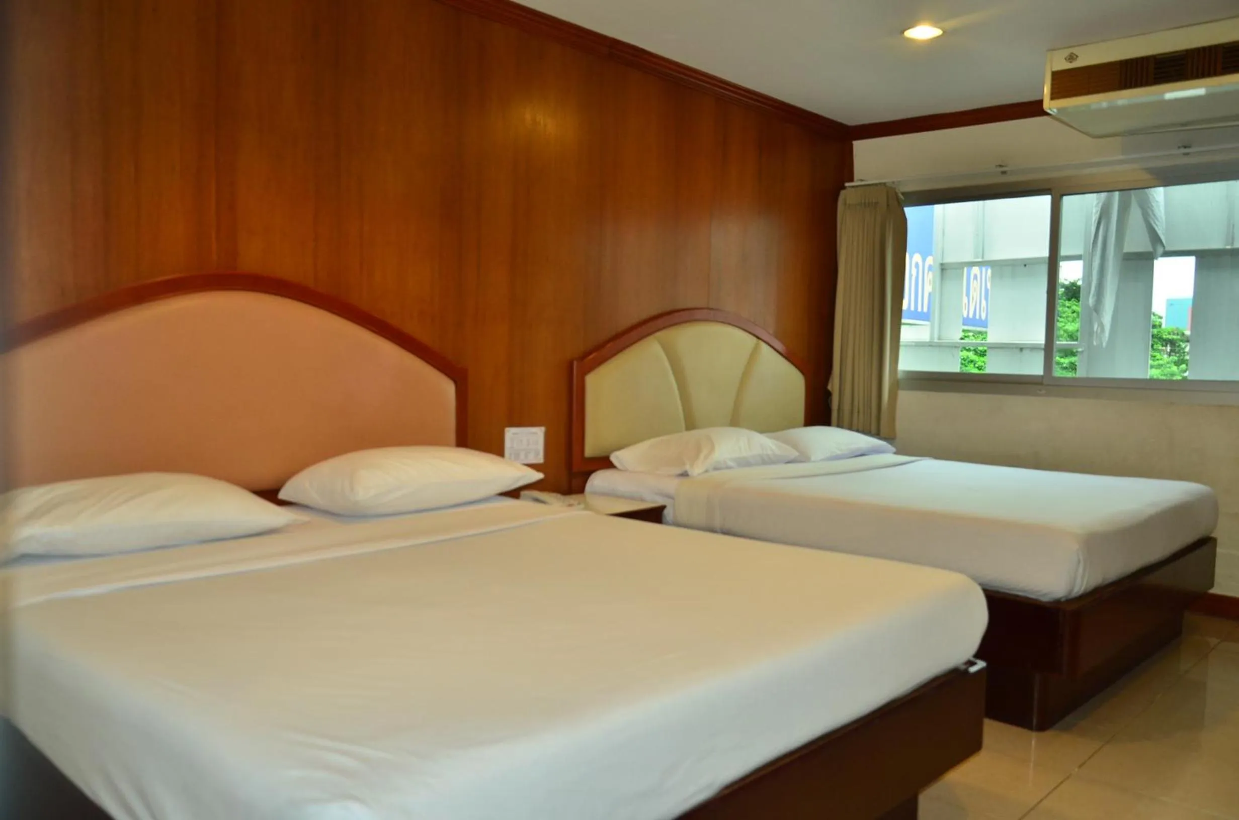 Bed in At Bangkok Hotel