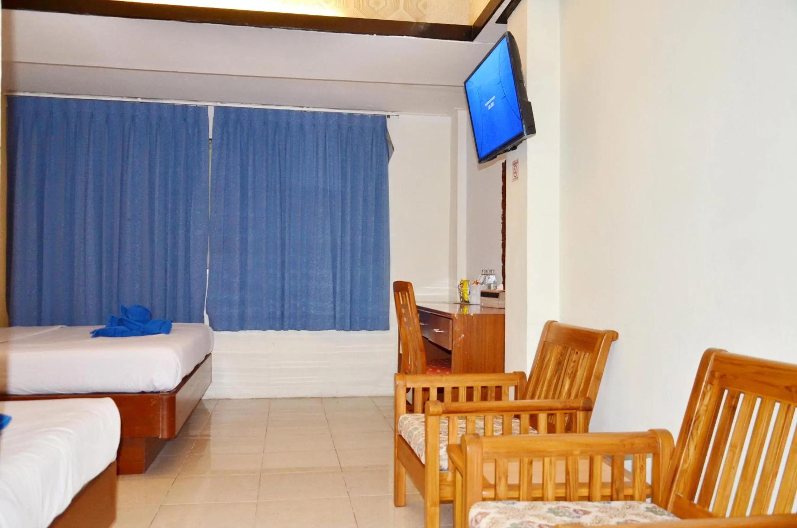 Bedroom in At Bangkok Hotel