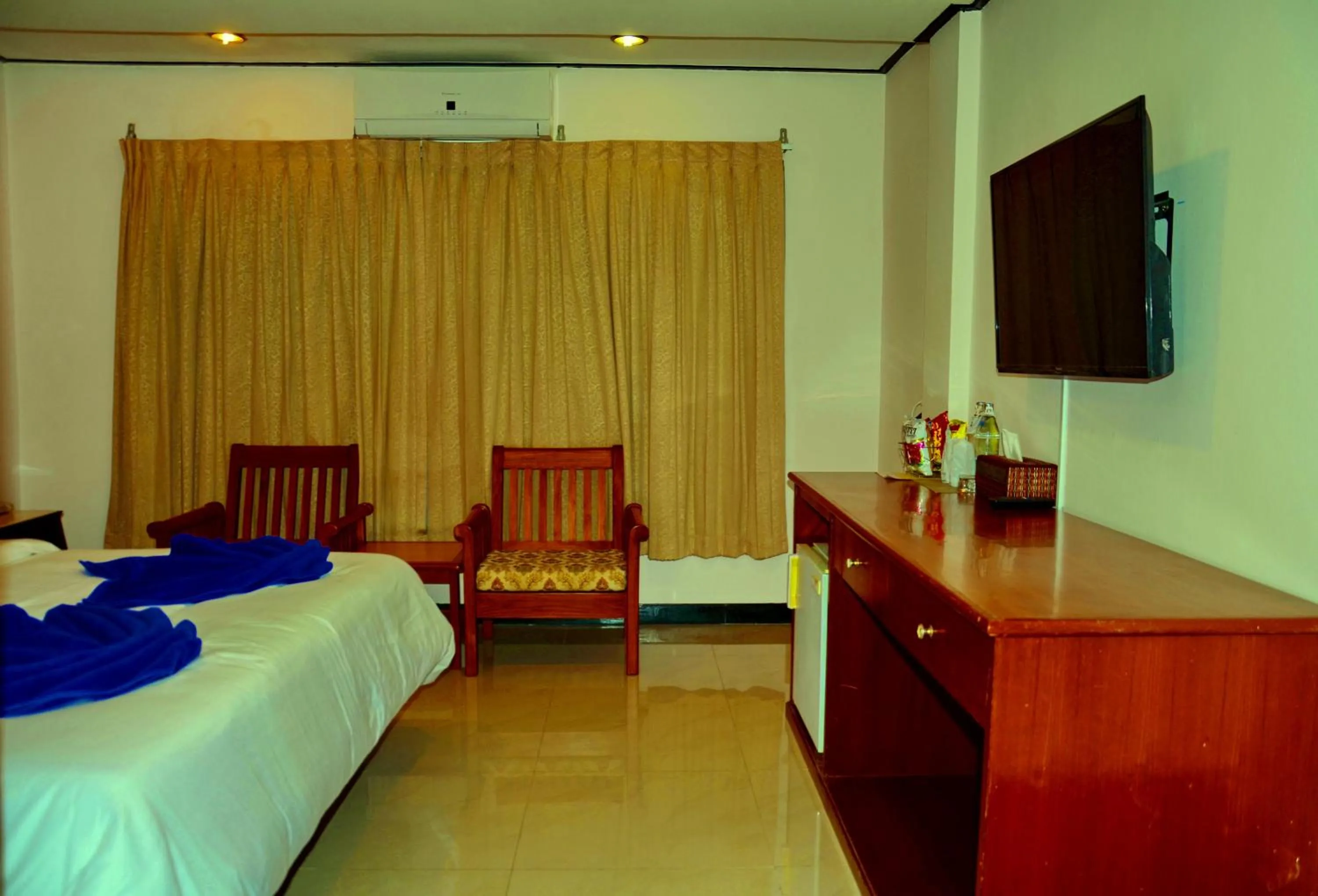 Bedroom in At Bangkok Hotel