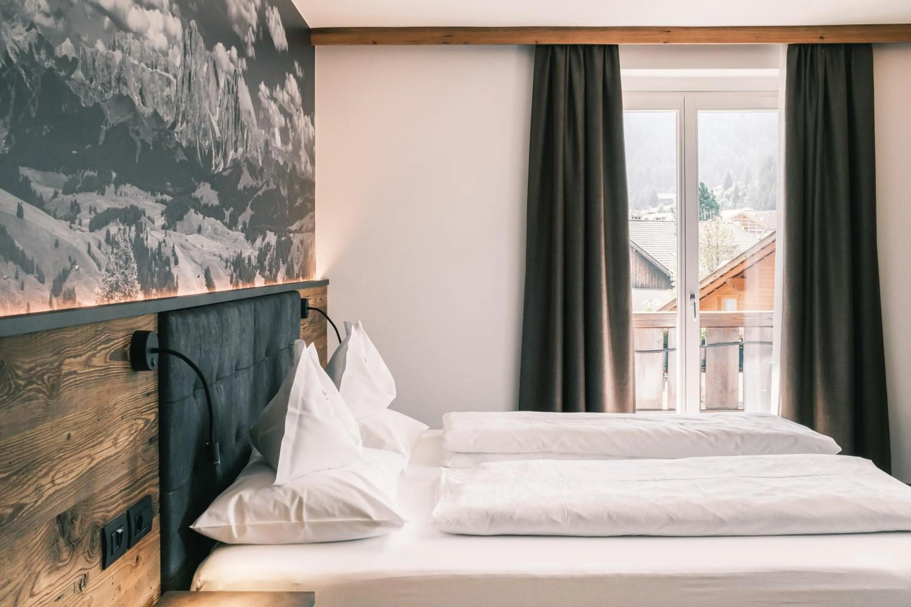 Bed in Kristiania Small Dolomites Hotel