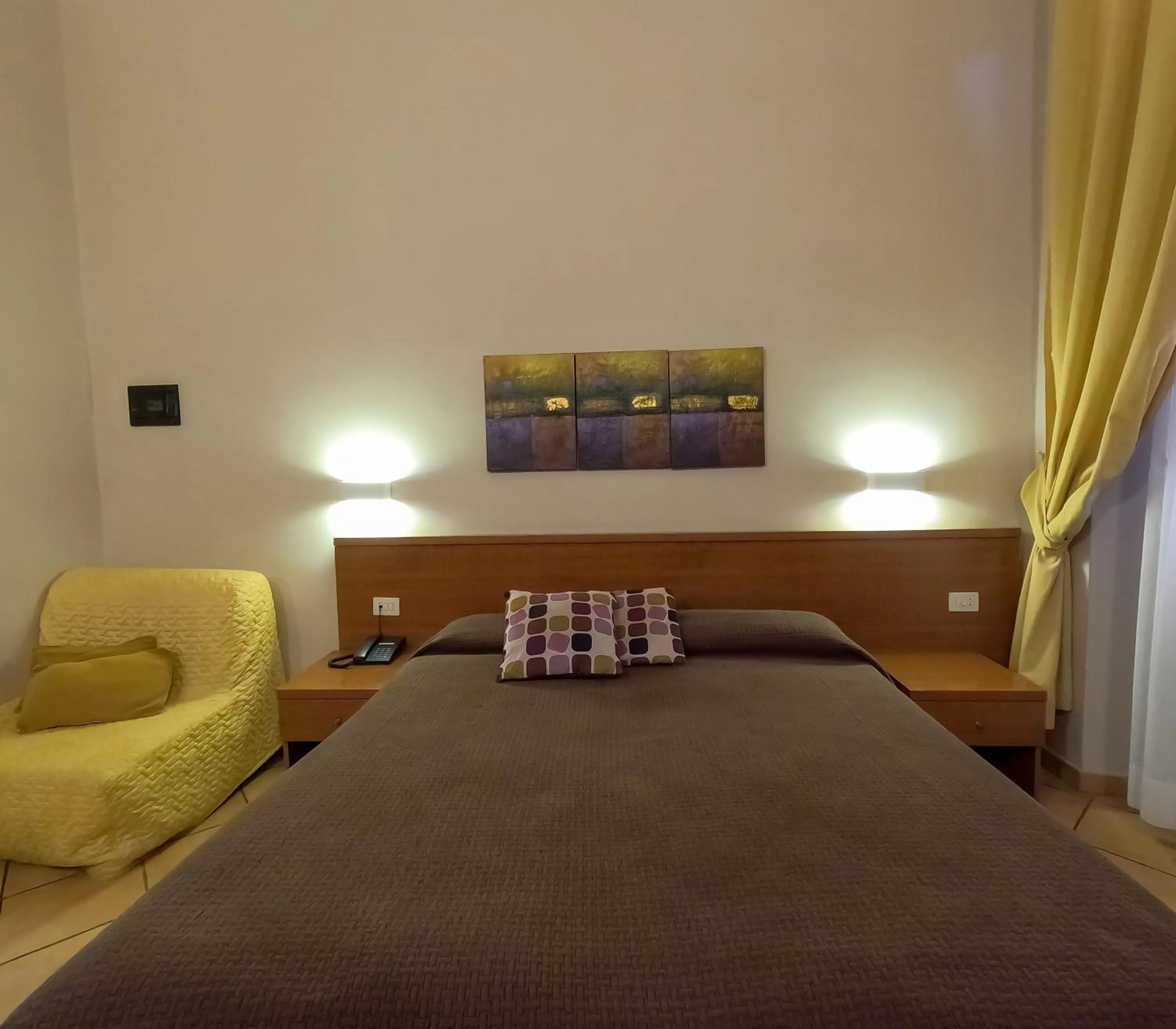 Bed in Hotel Cervia
