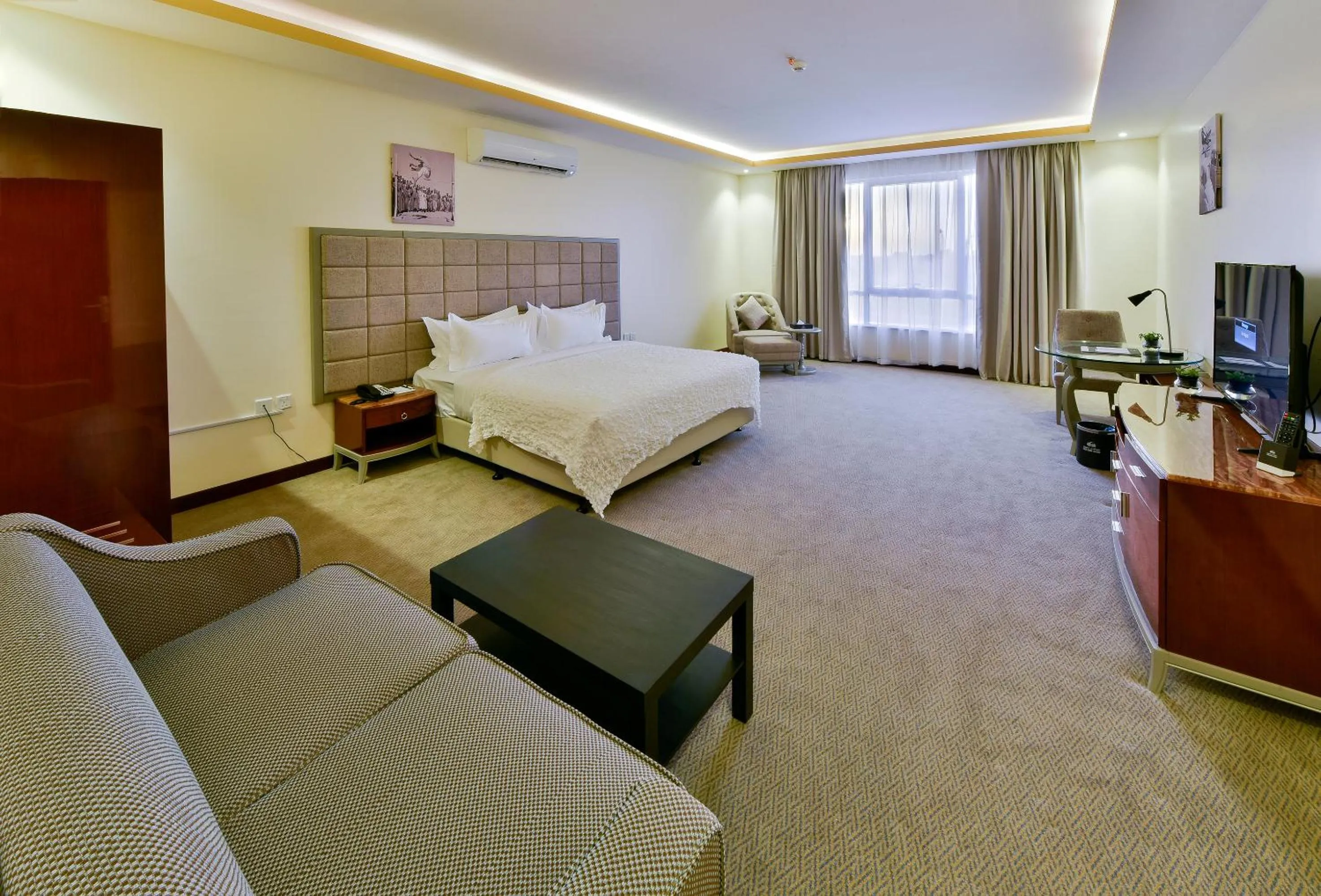 Bed in Golden Dune Hotel Turaif