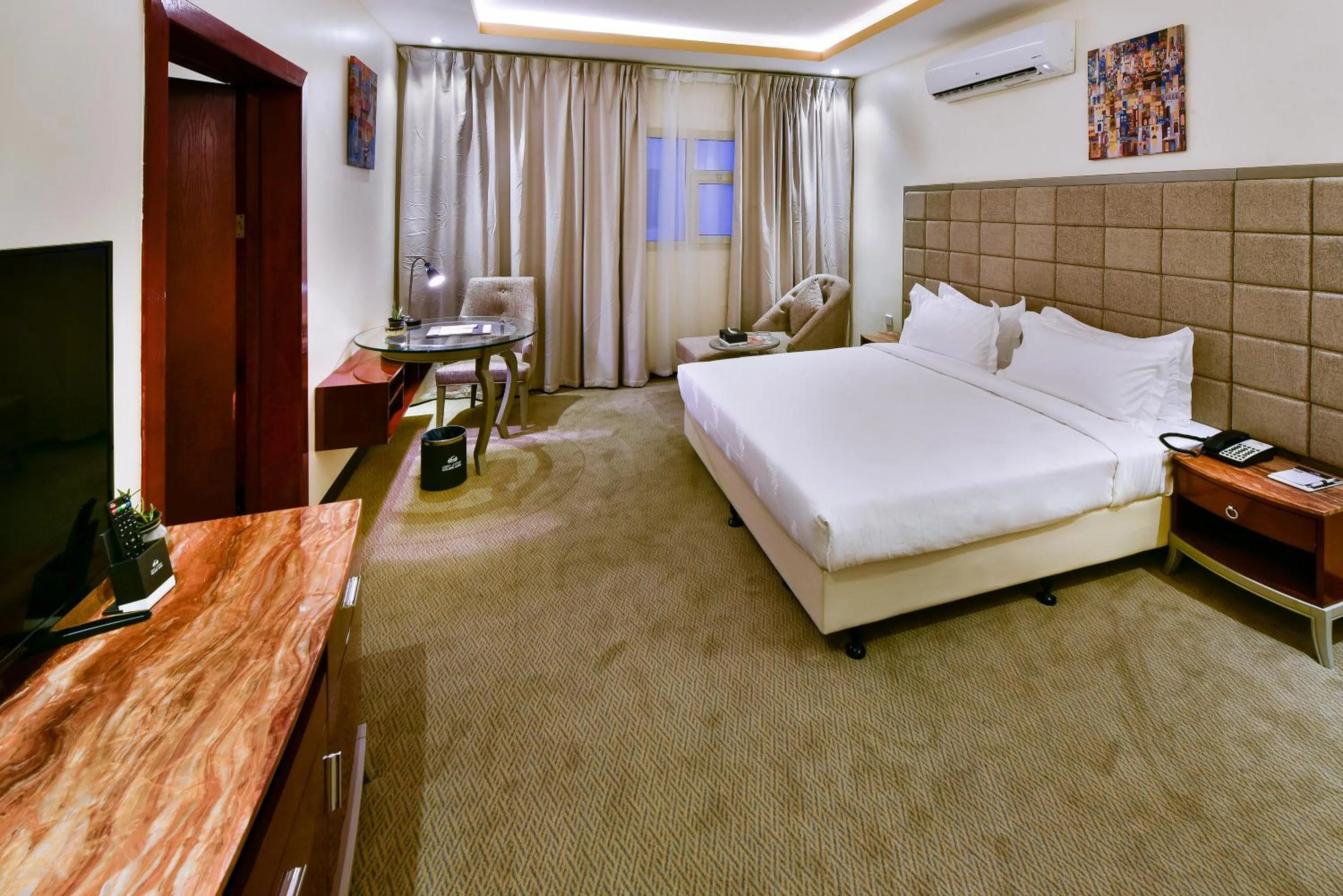 Bed in Golden Dune Hotel Turaif