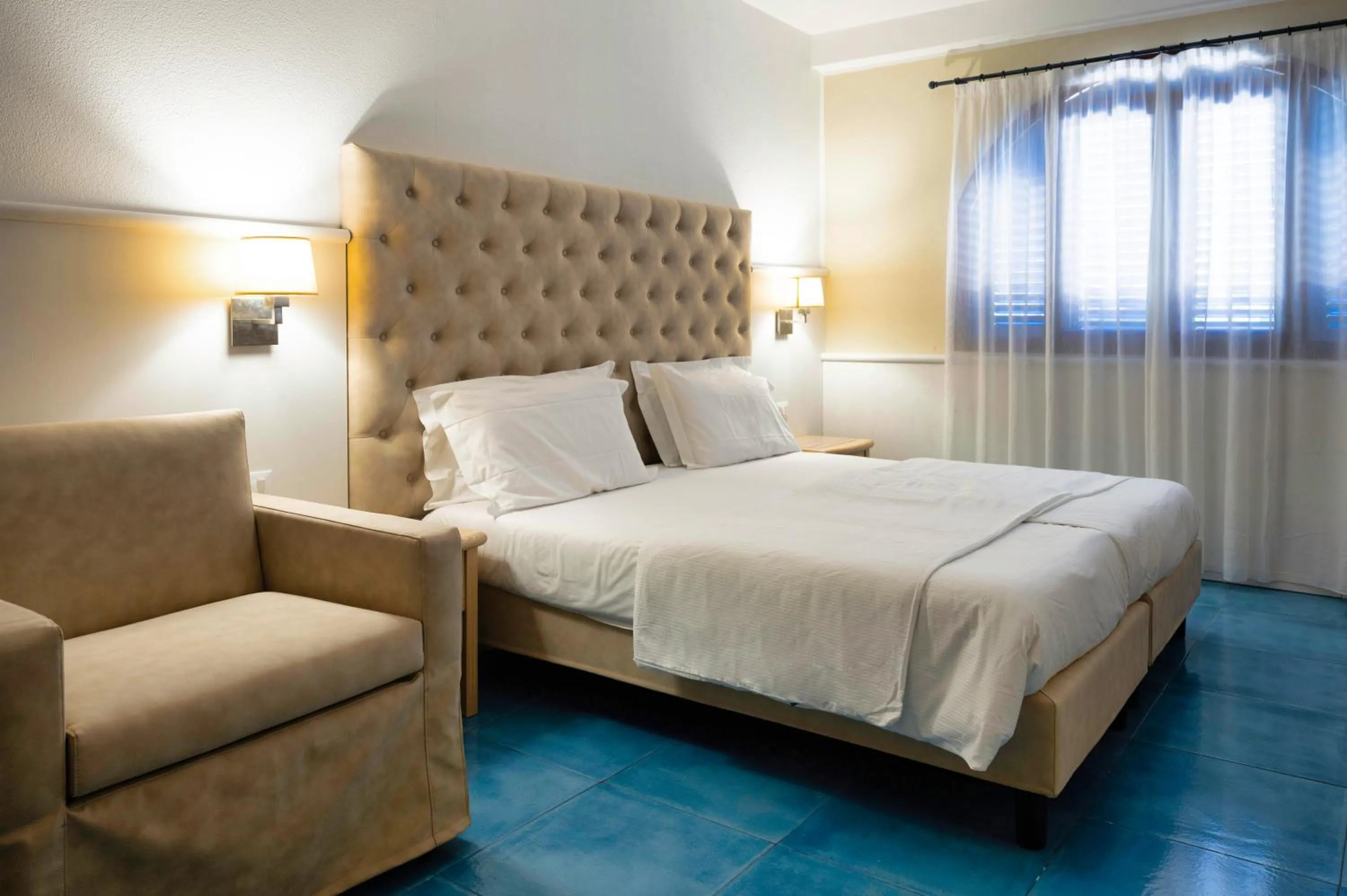 Bed in Arathena Rocks Hotel