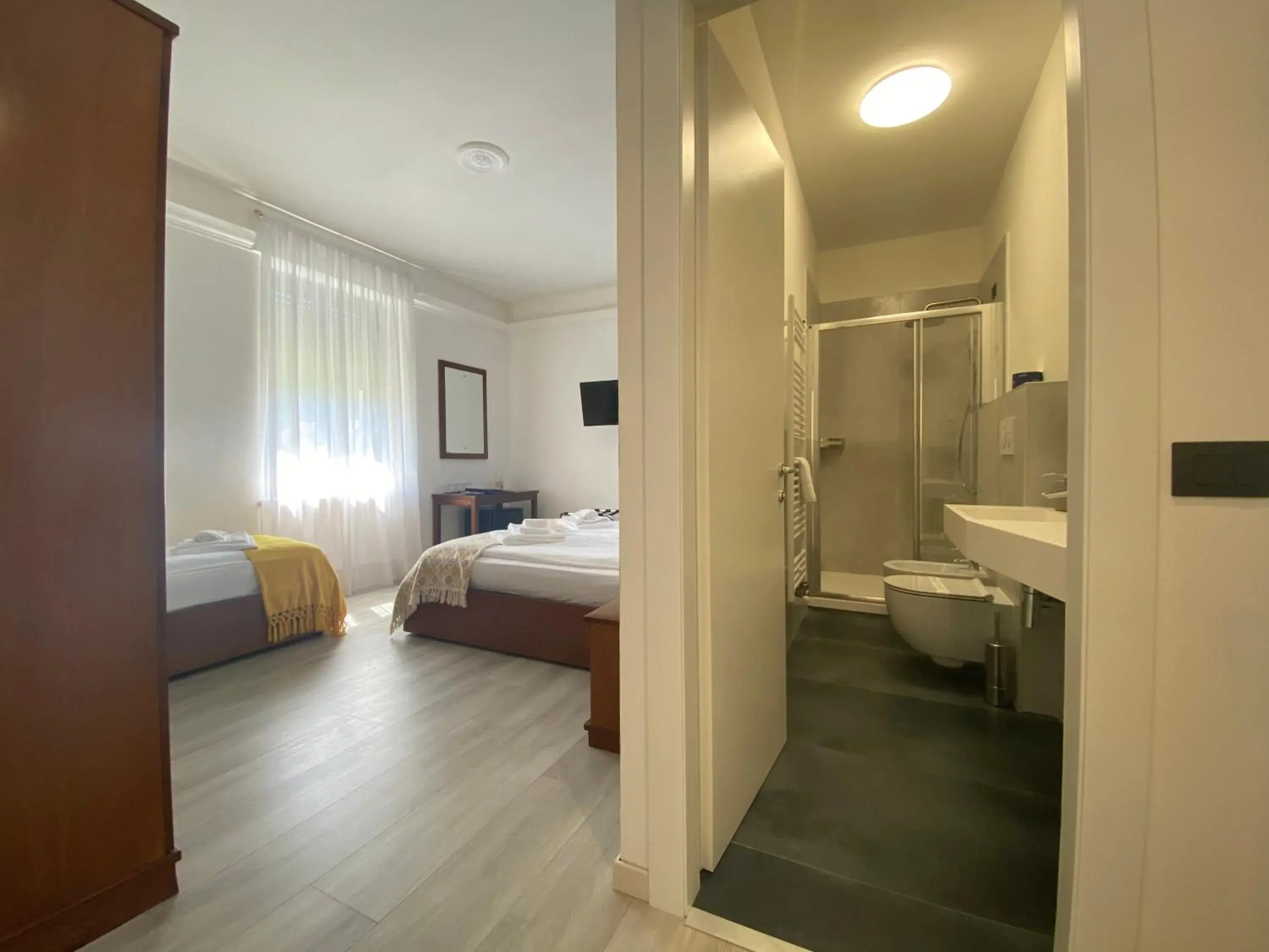 Triple Room with Lake View in Hotel La Fontana Triple Room with Lake View in Hotel La Fontana