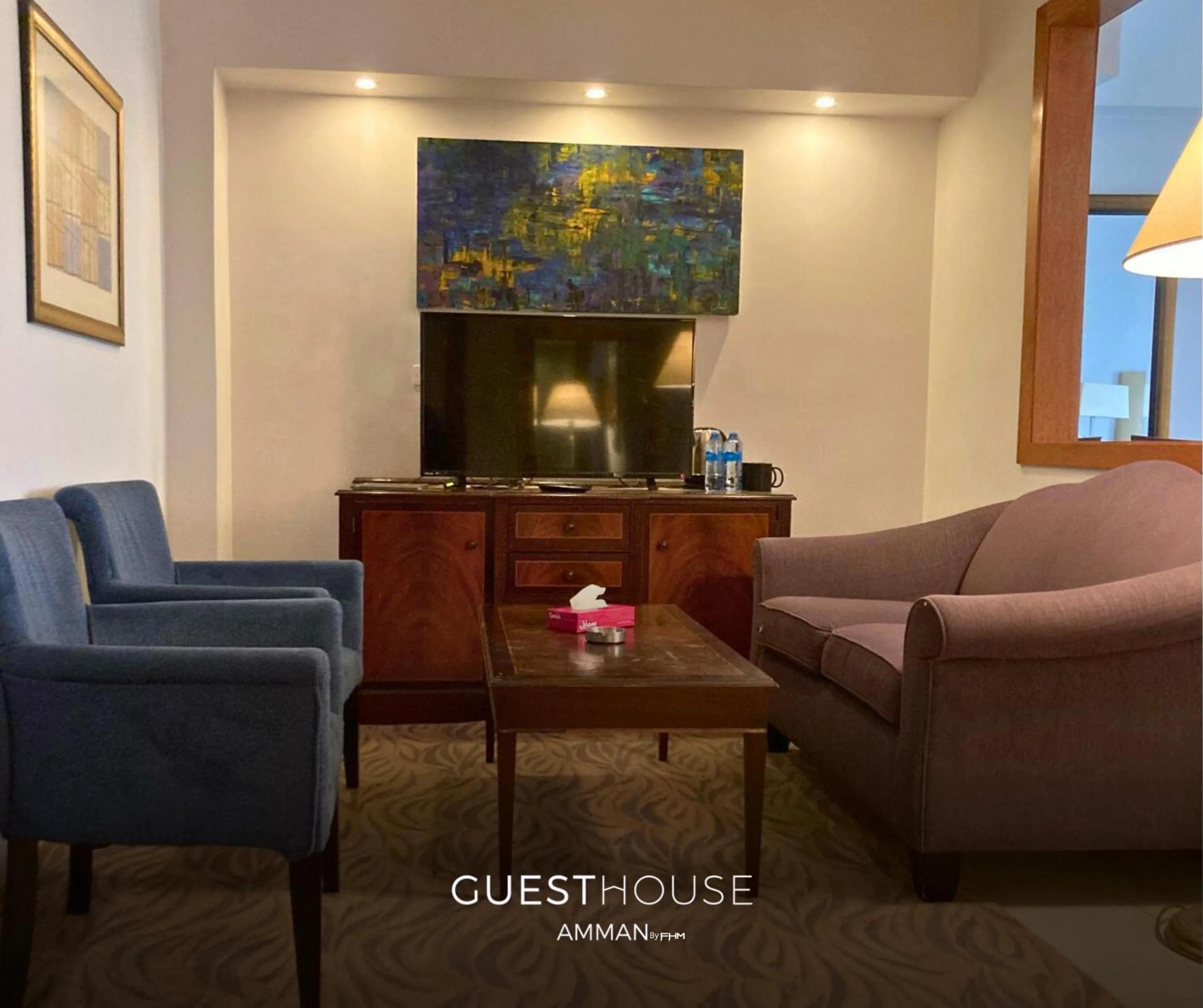 Seating area in Guest House Hotel Amman by FHM