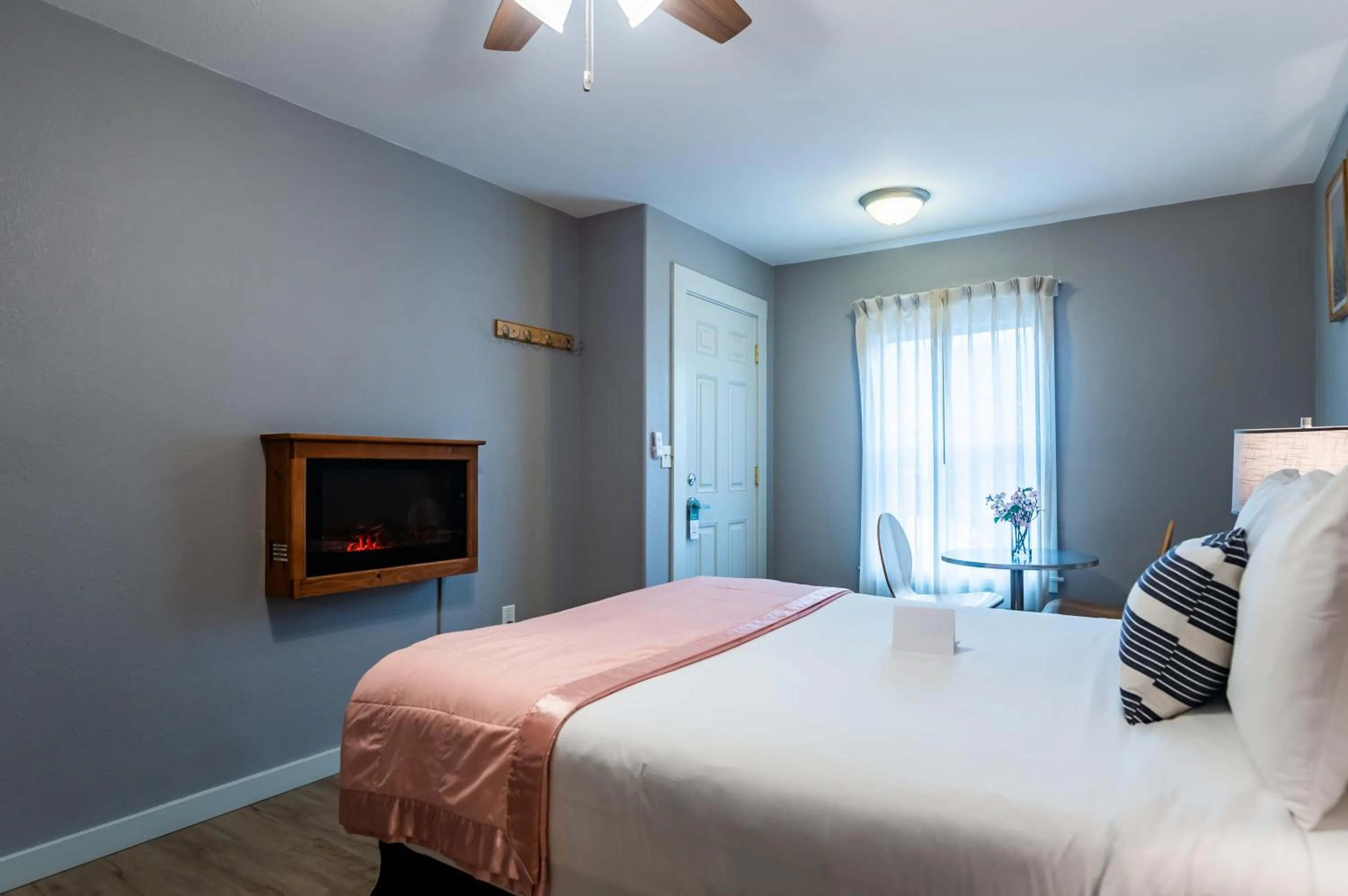 fireplace, Bed in Inn at Haystack Rock