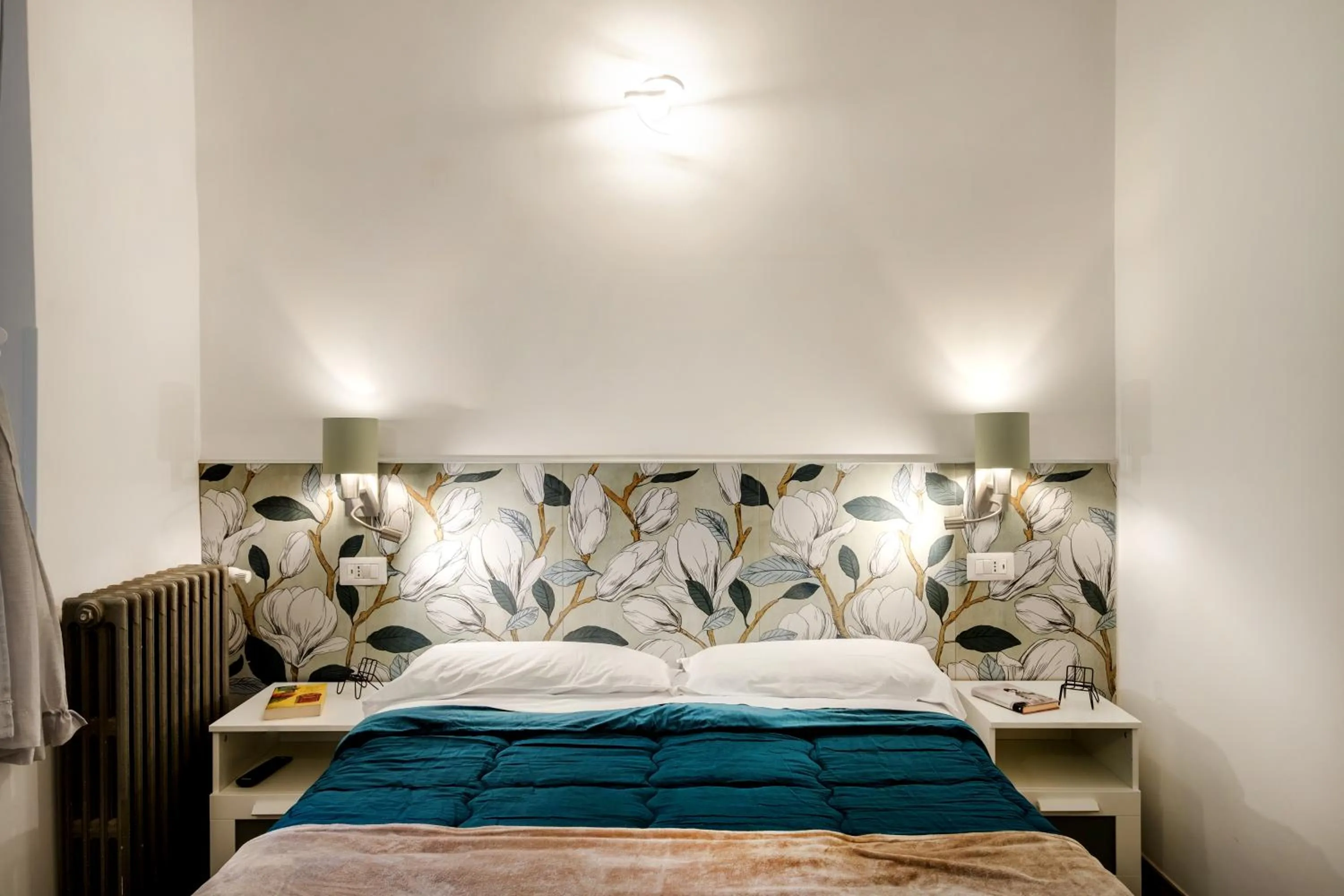 Decorative detail, Bed in Vatican36 Guest House