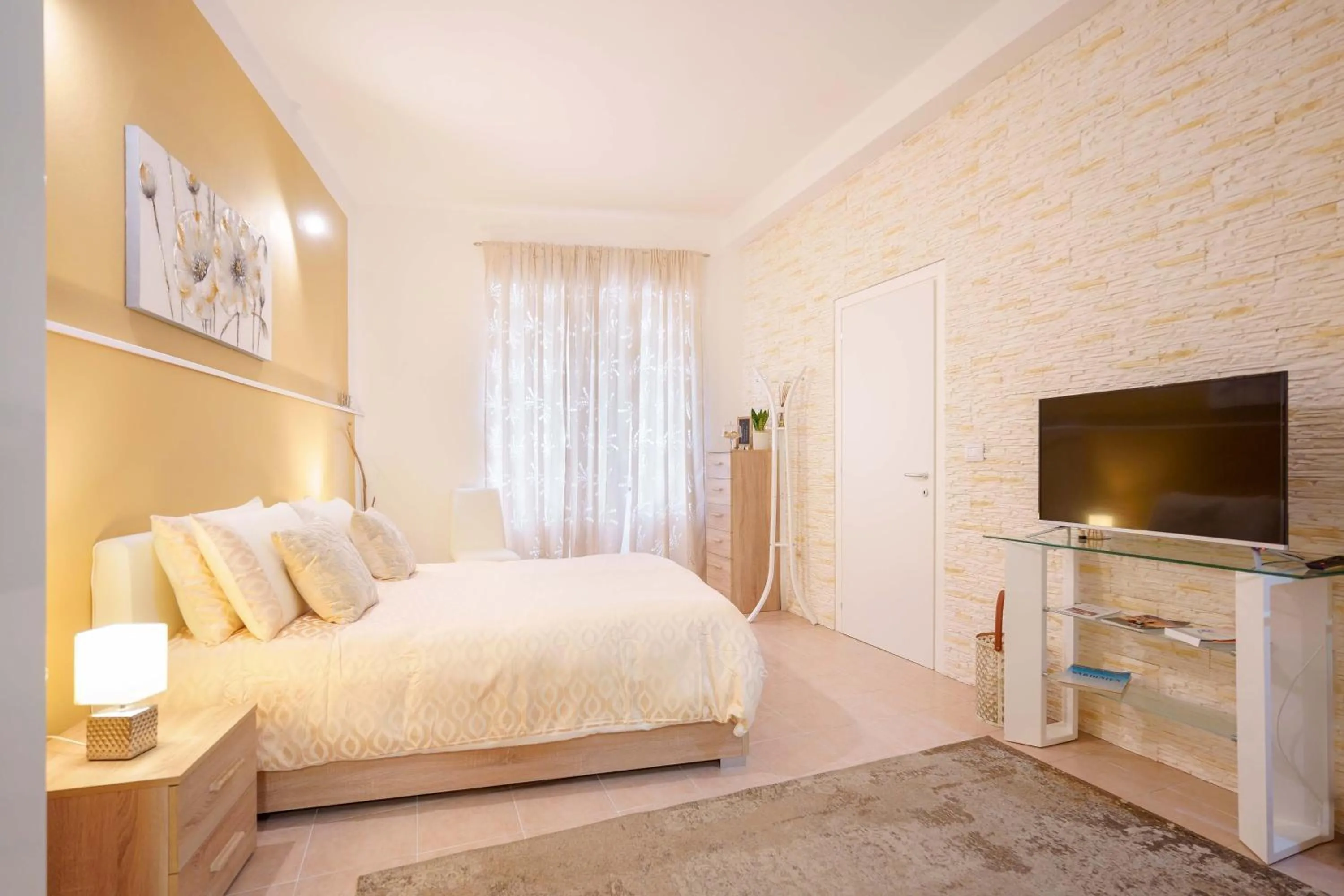 Bedroom in Montellino's Suite Oro