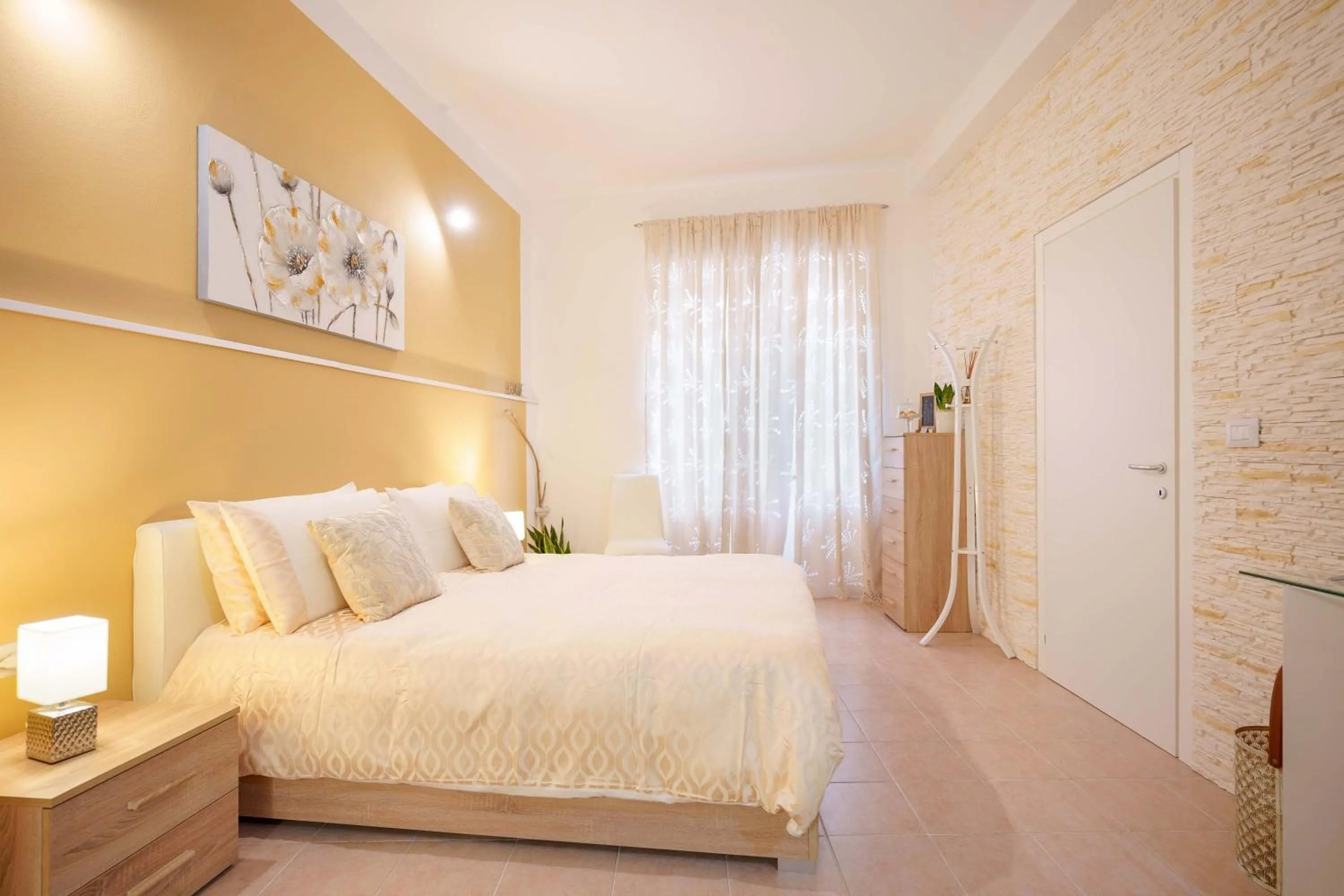 Bedroom in Montellino's Suite Oro
