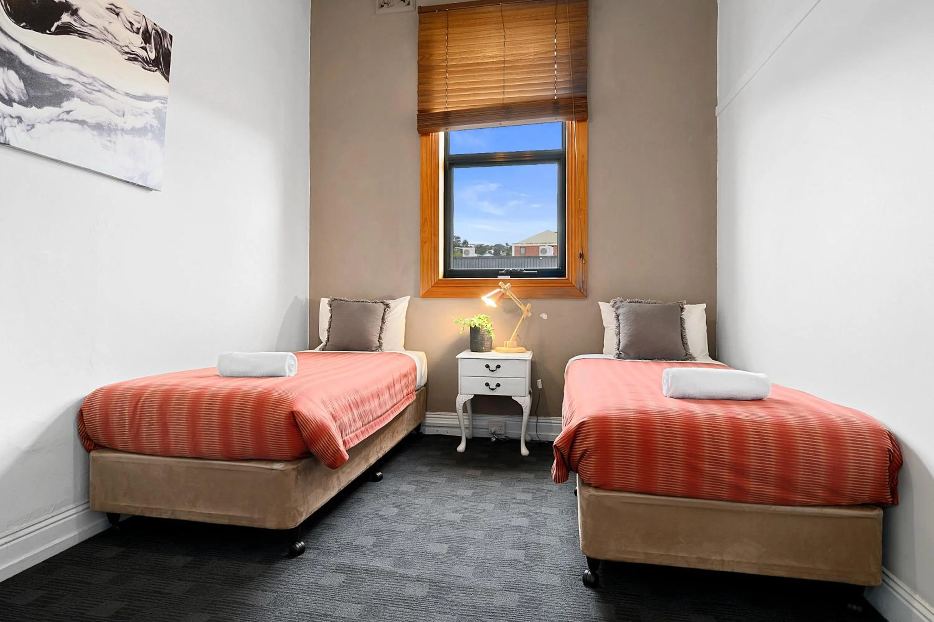 Bed in Burnie City Apartments