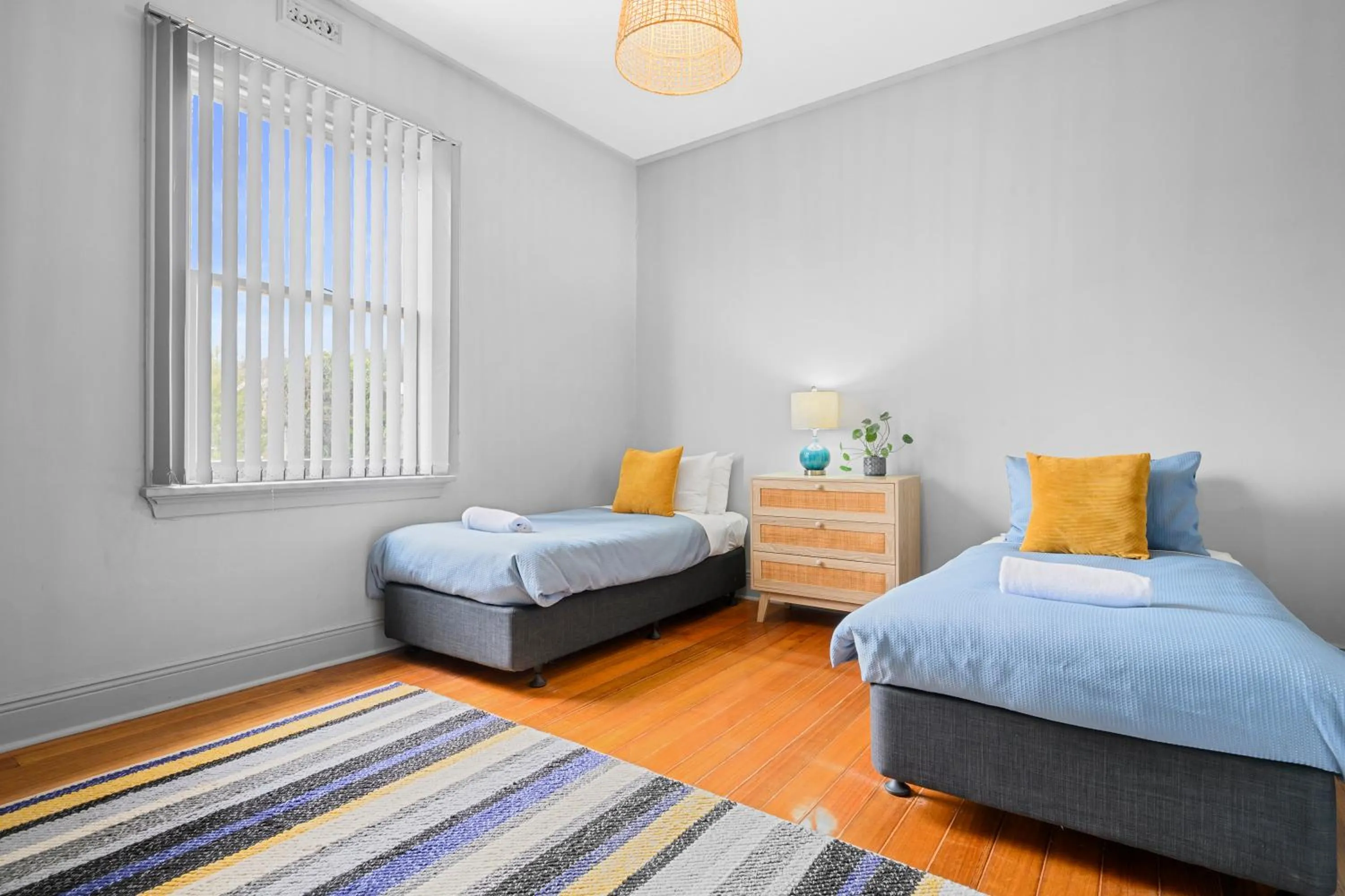 Bed in Burnie City Apartments