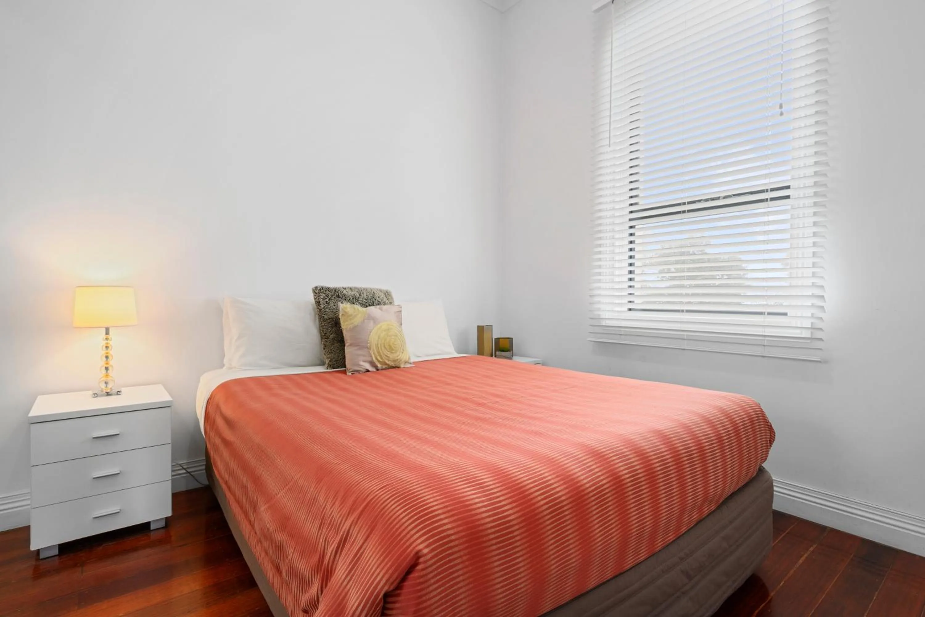 Bed in Burnie City Apartments