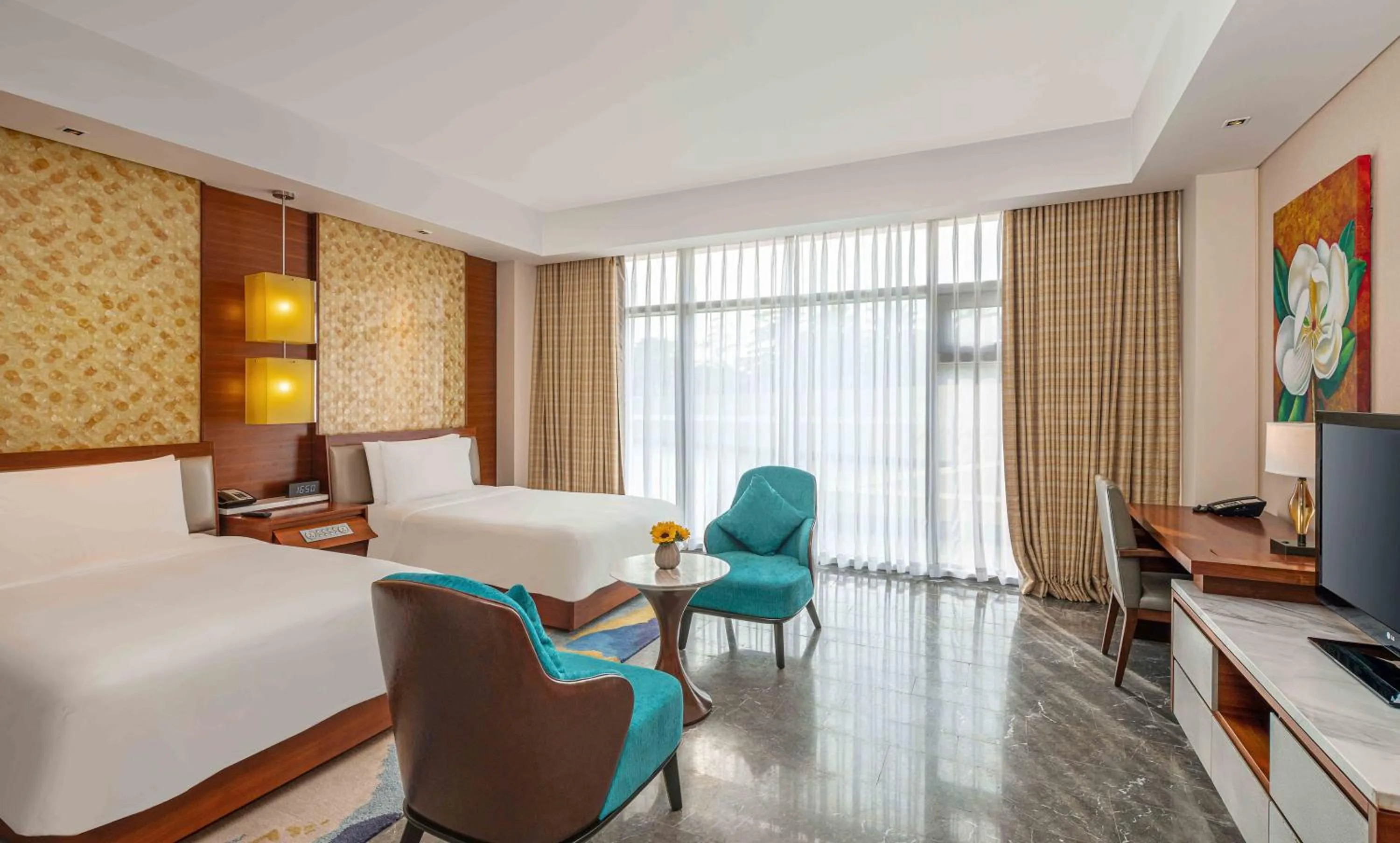 Photo of the whole room, Bed in MGM Grand Sanya