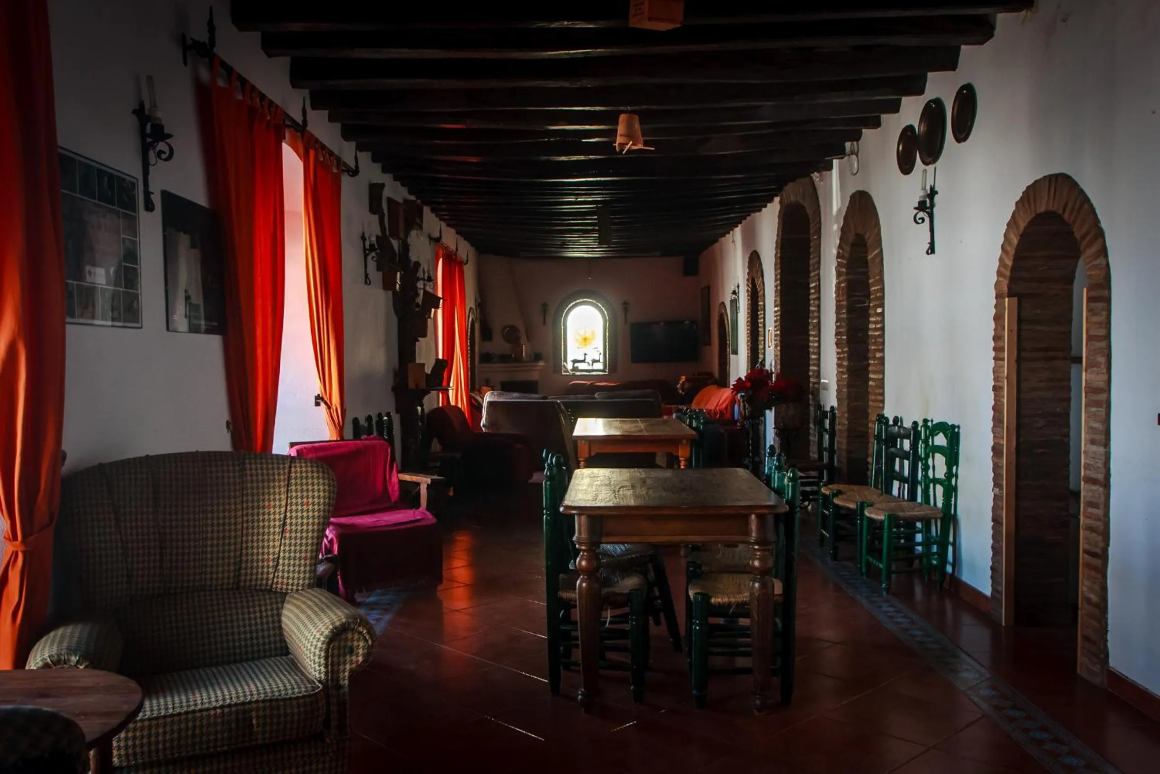 Communal lounge/ TV room in Posada La Casa Grande