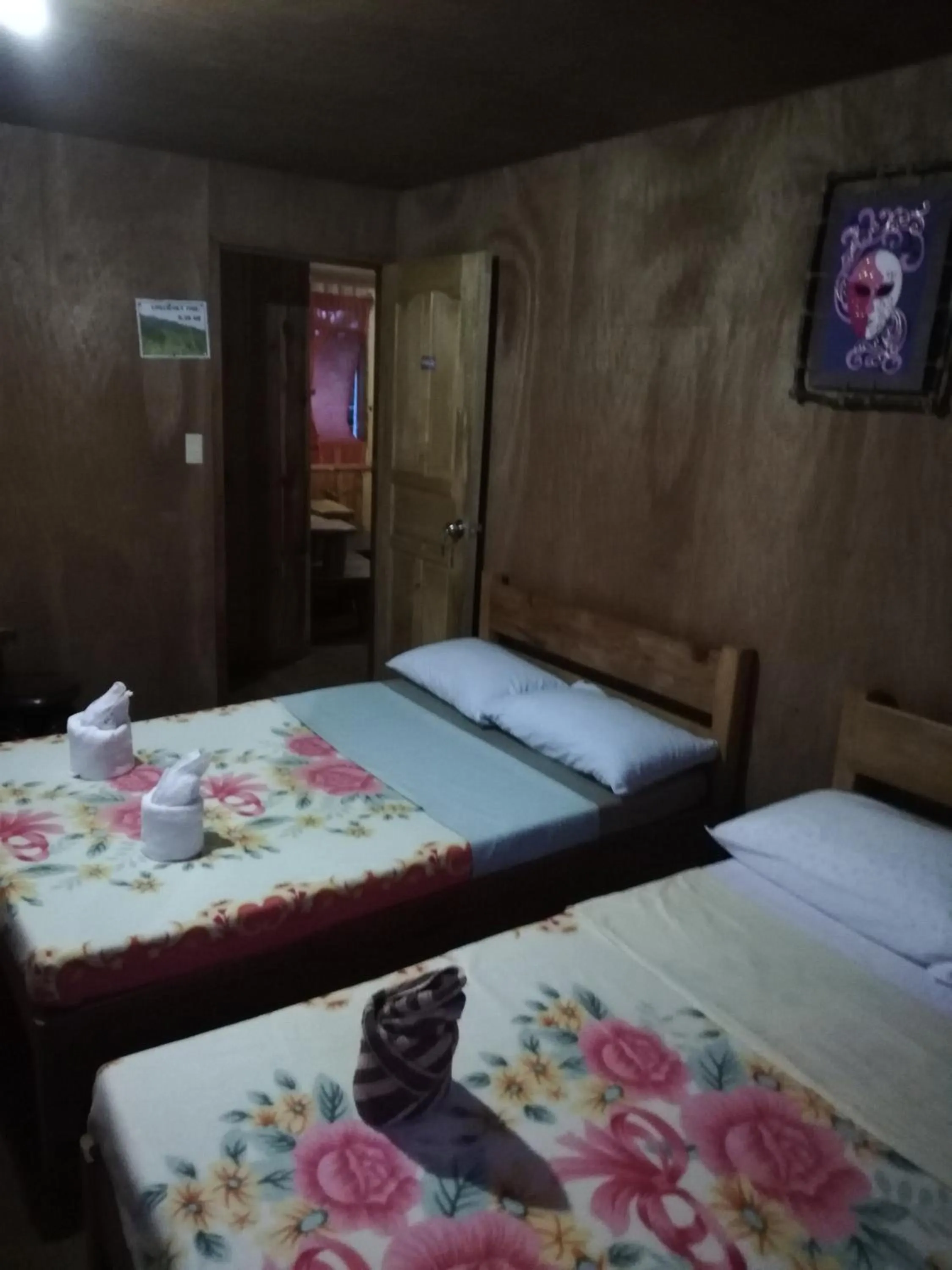 Bed in 7th Heaven Lodge and Cafe