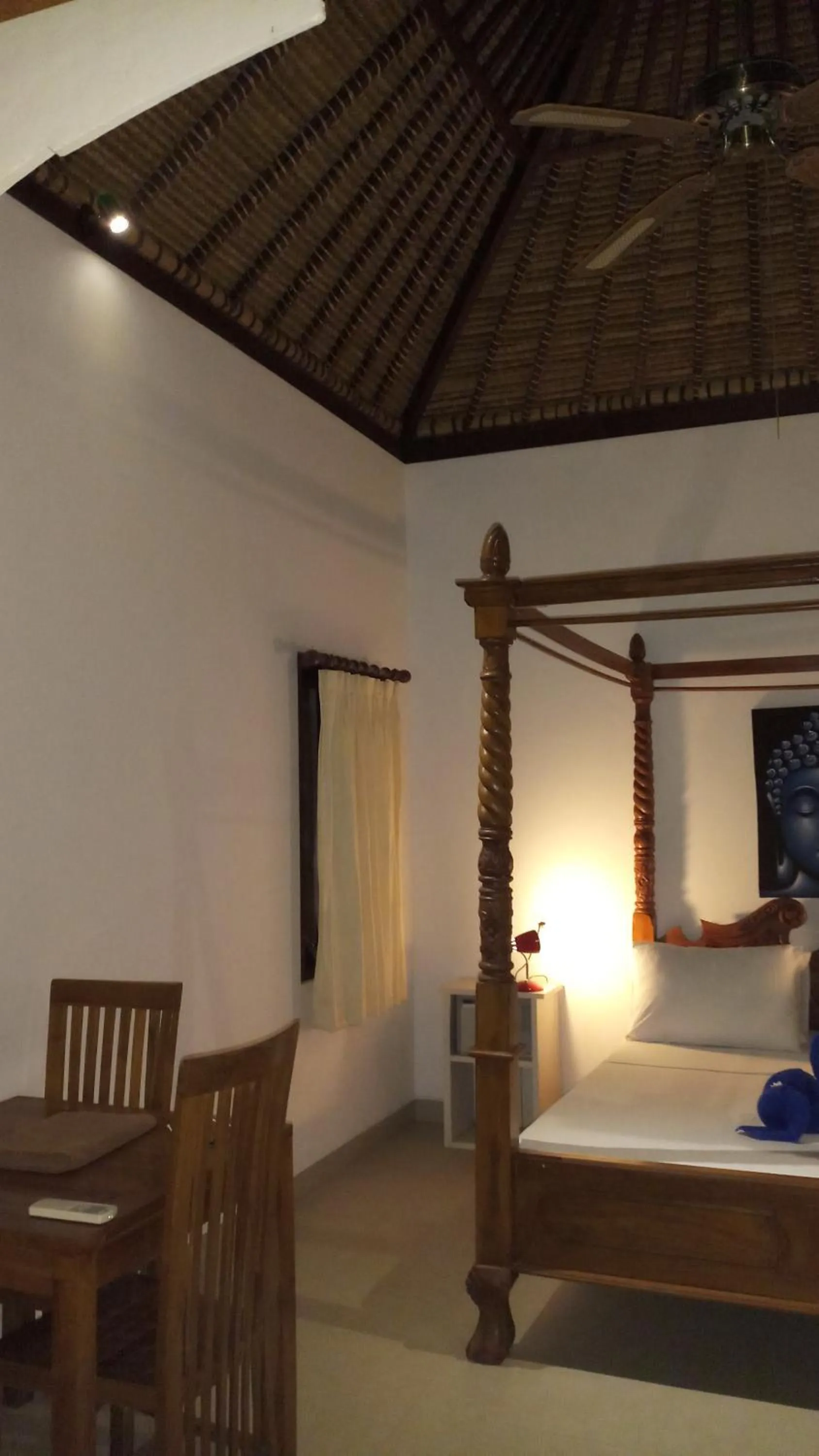 Bed in Jemeluk Beach Bungalows