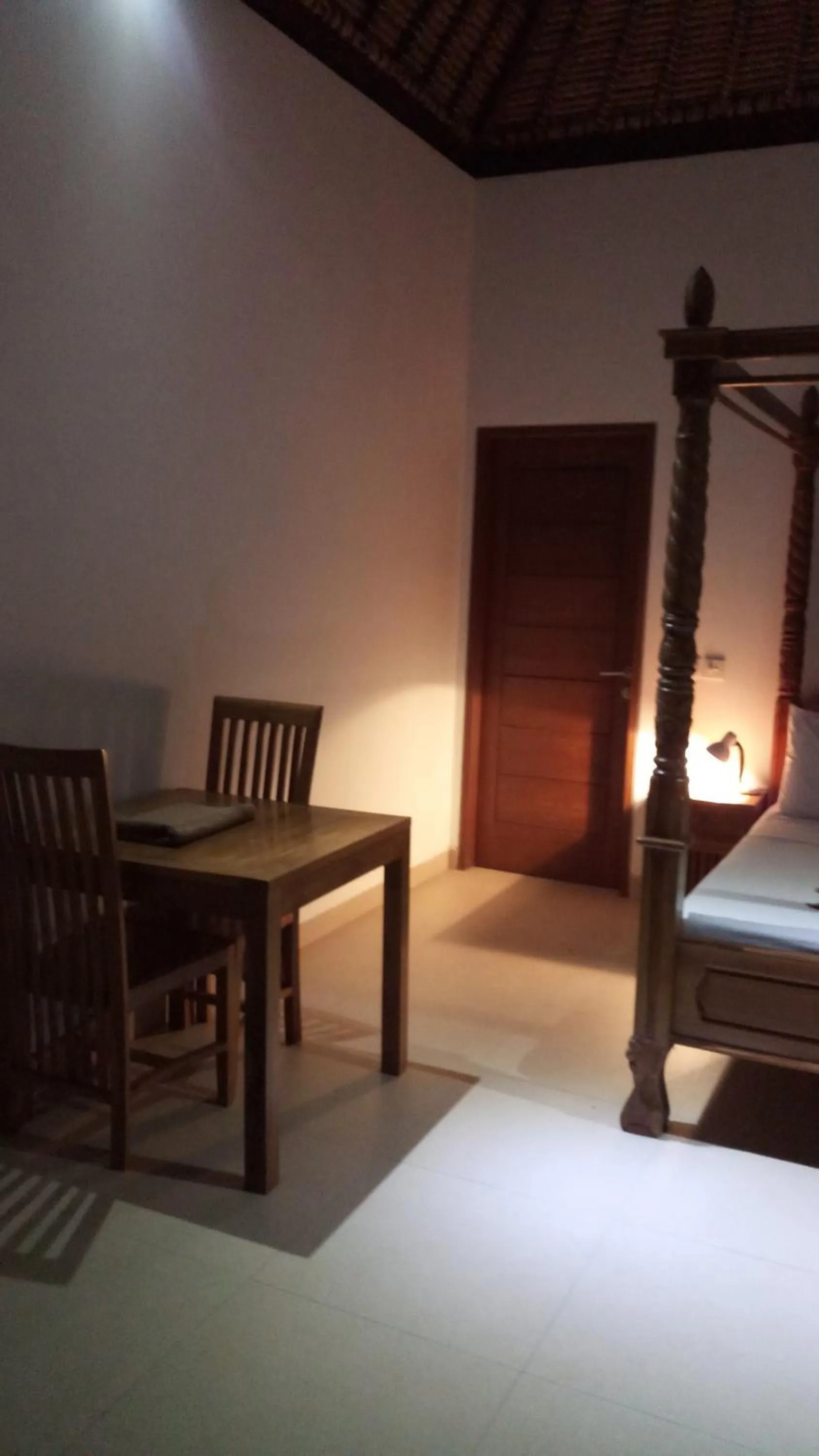 Bed in Jemeluk Beach Bungalows