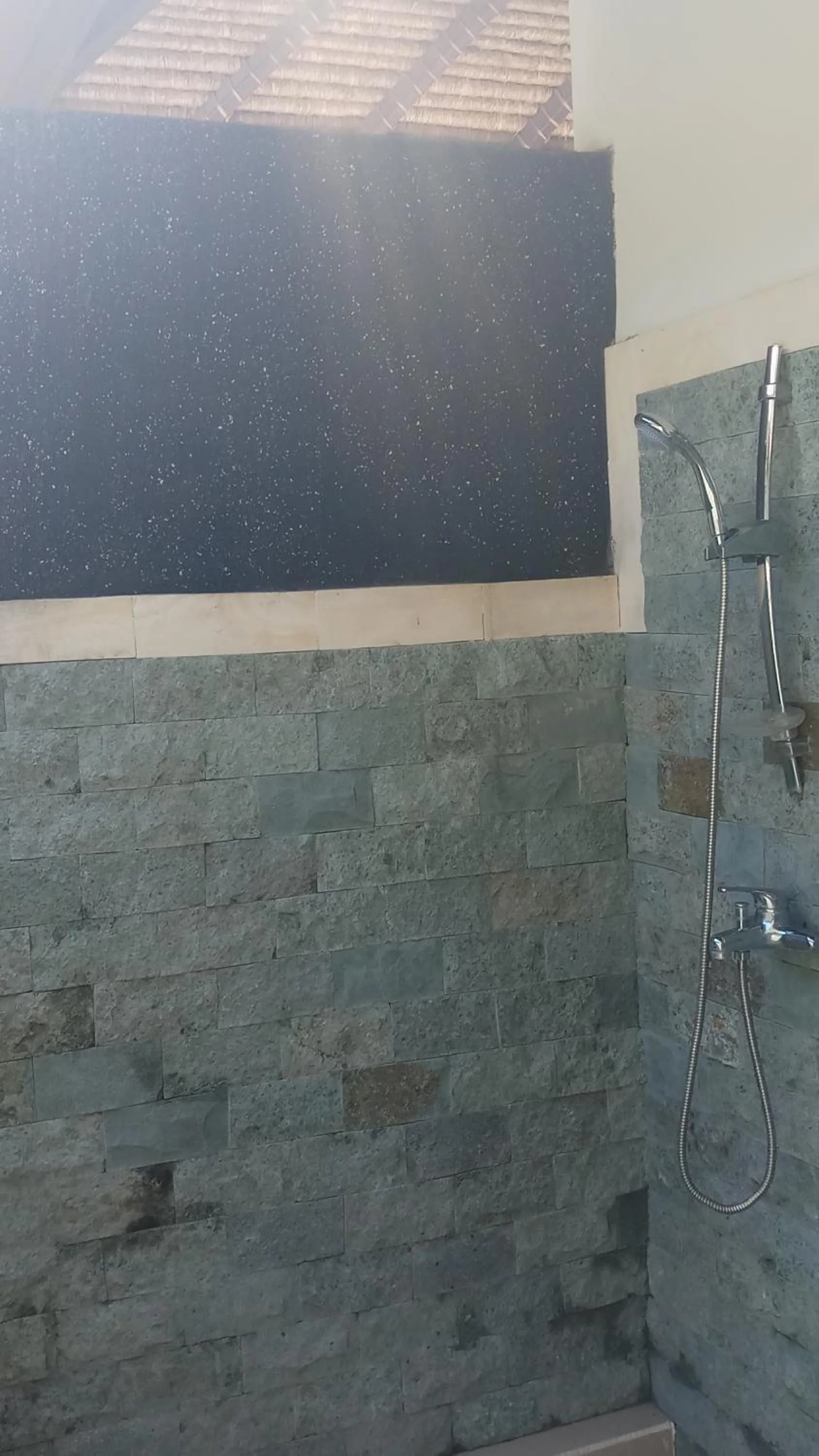 Bathroom in Jemeluk Beach Bungalows