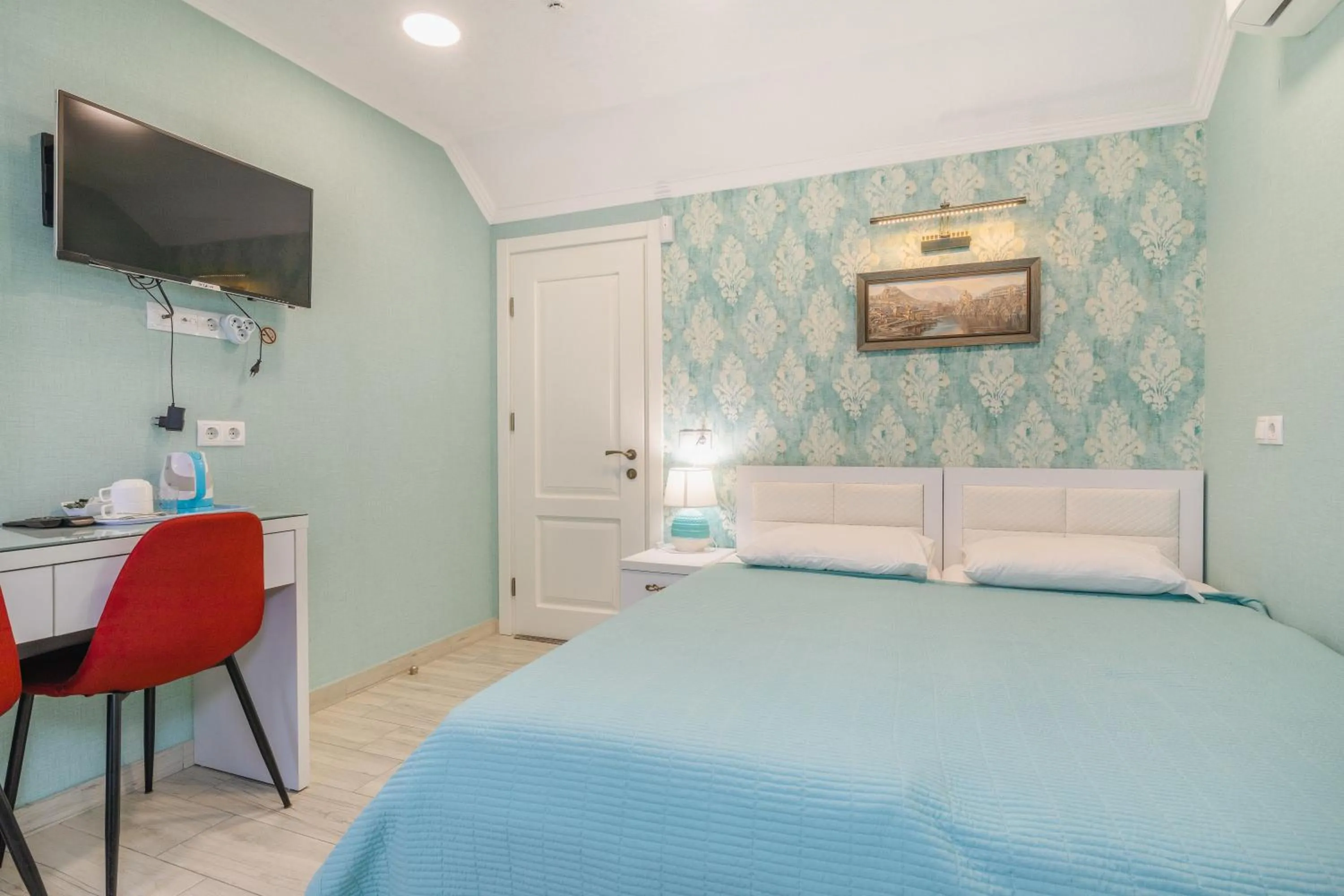 Bed in Hotel Nicolas