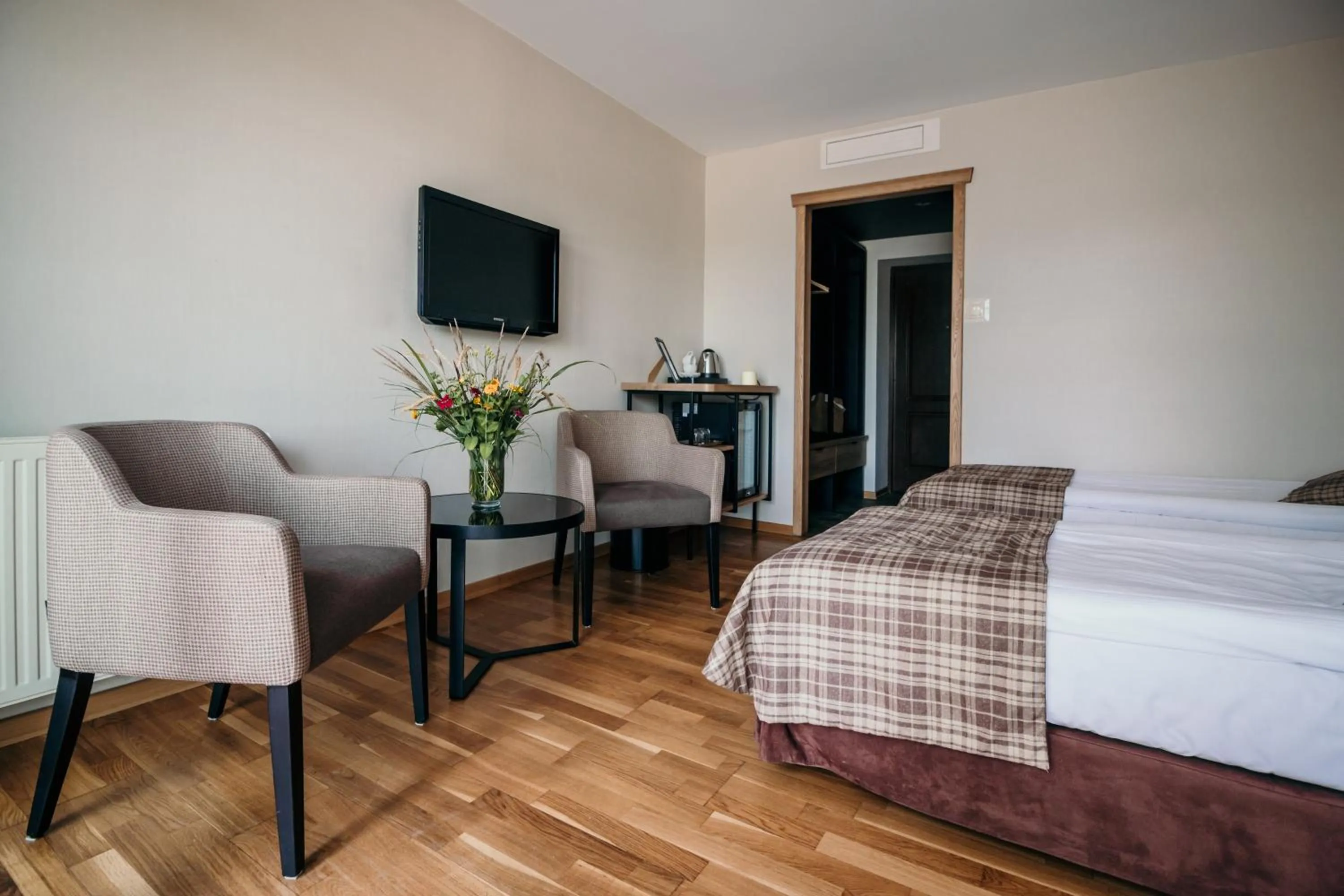 Seating area, Bed in Hotel Osada Karbówko Wellness & SPA