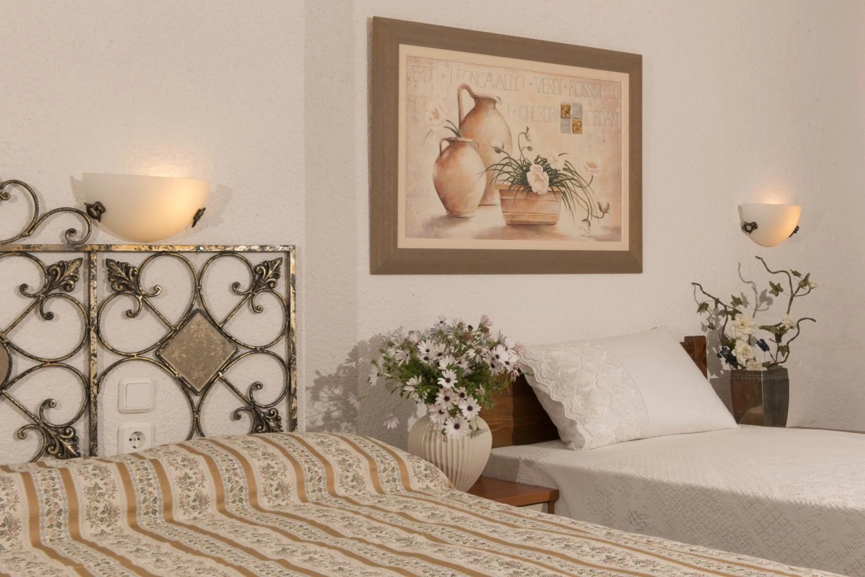 Bed in Leandros Hotel