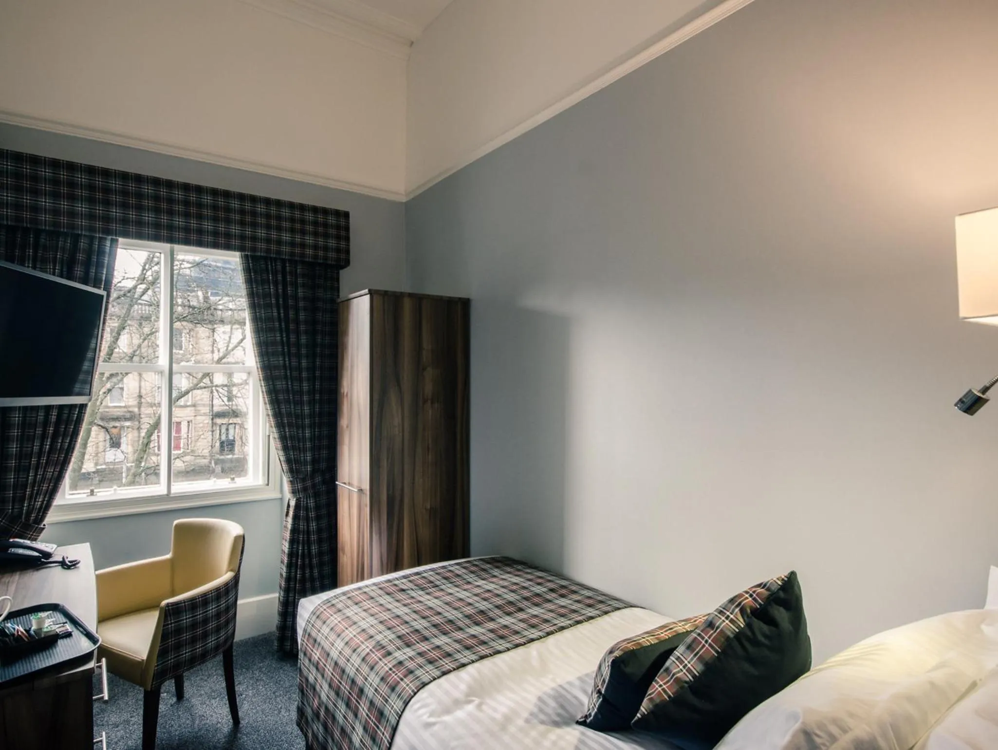 Bed in Royal West End Hotel