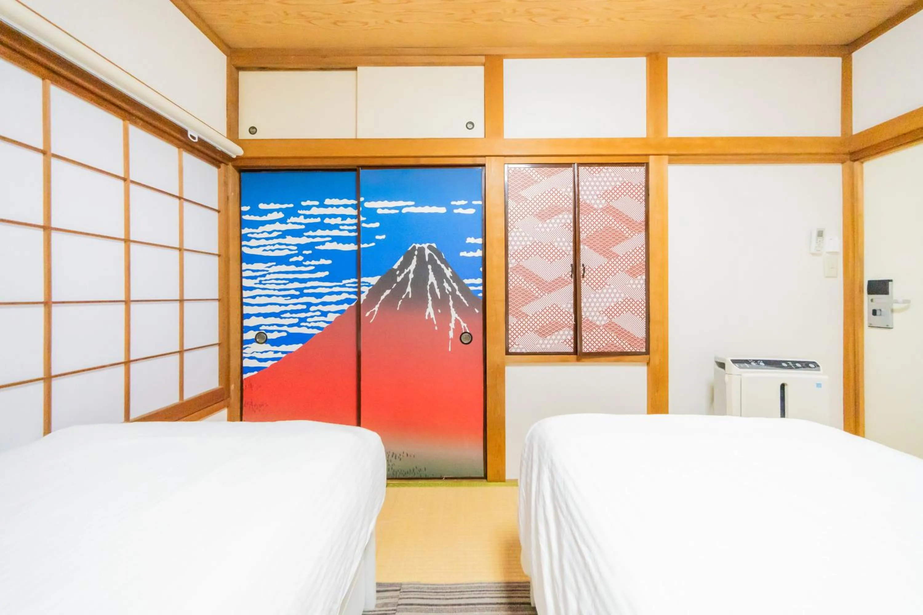 Bed in Ikebukuro no Yado detached house