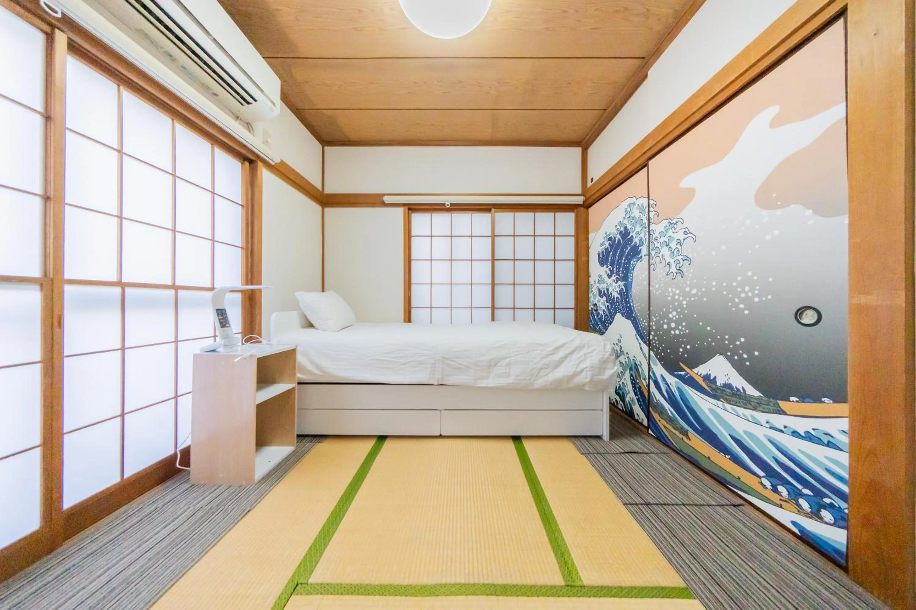 Bed in Ikebukuro no Yado detached house
