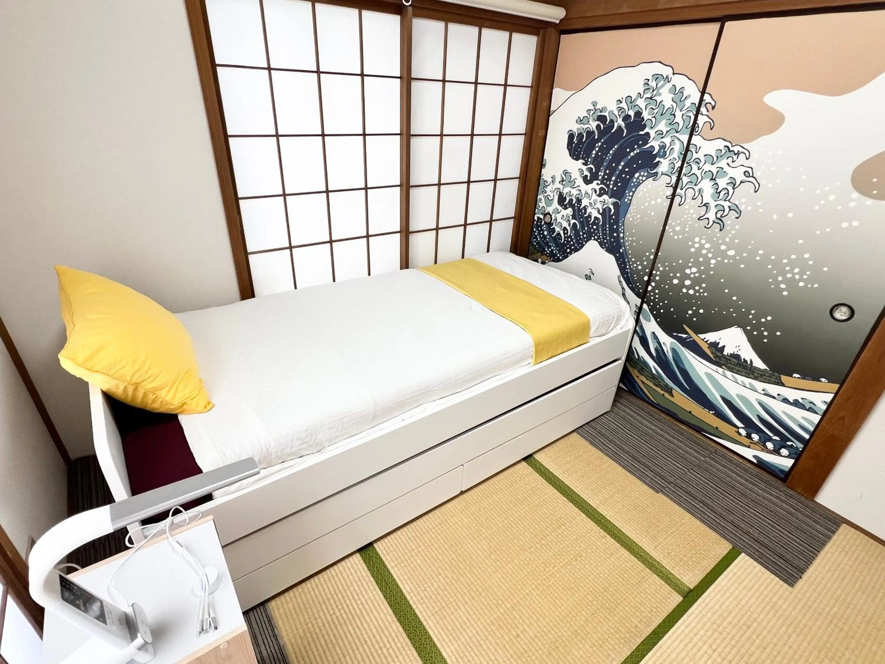 Bed in Ikebukuro no Yado detached house