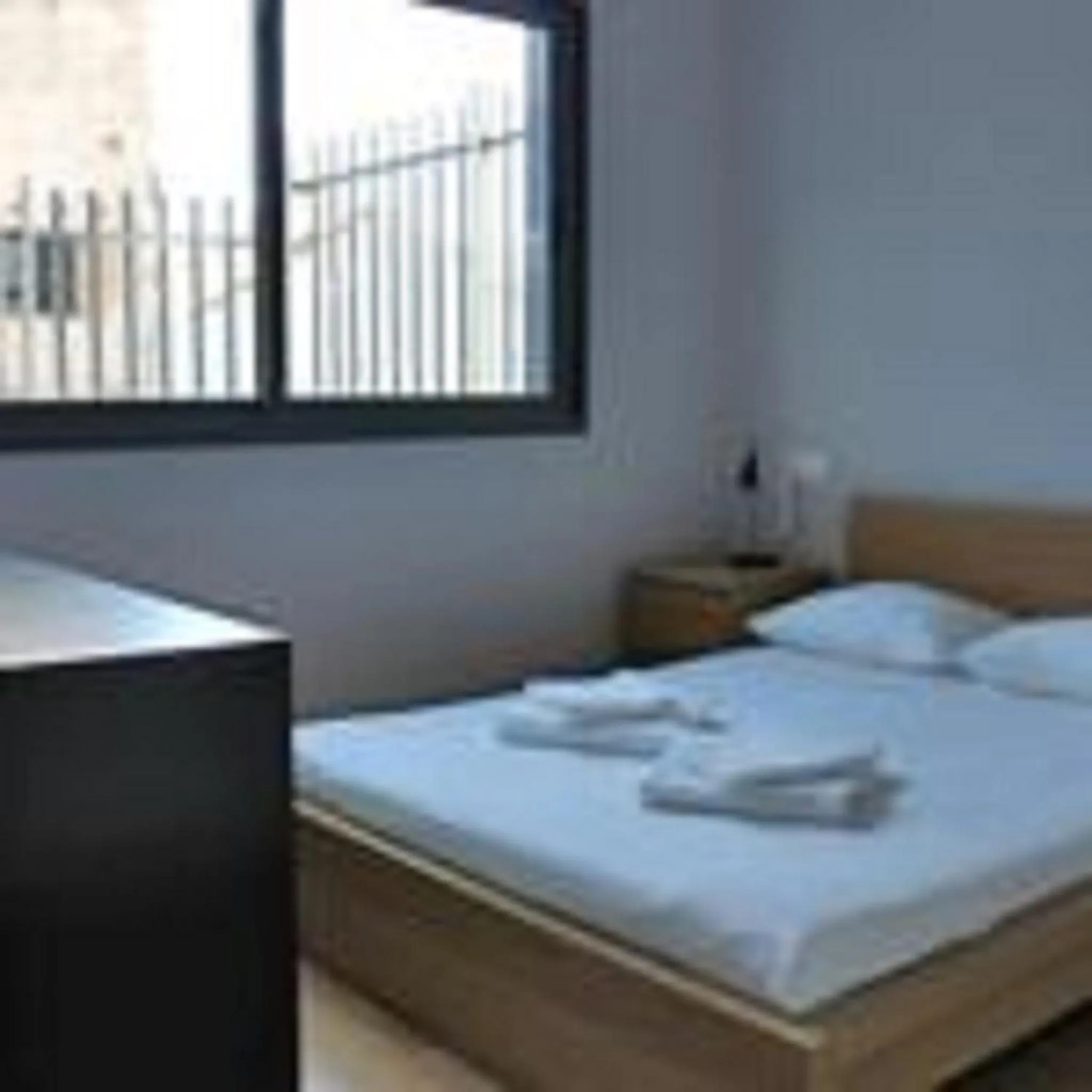 Bed in Apartamentos San Pablo