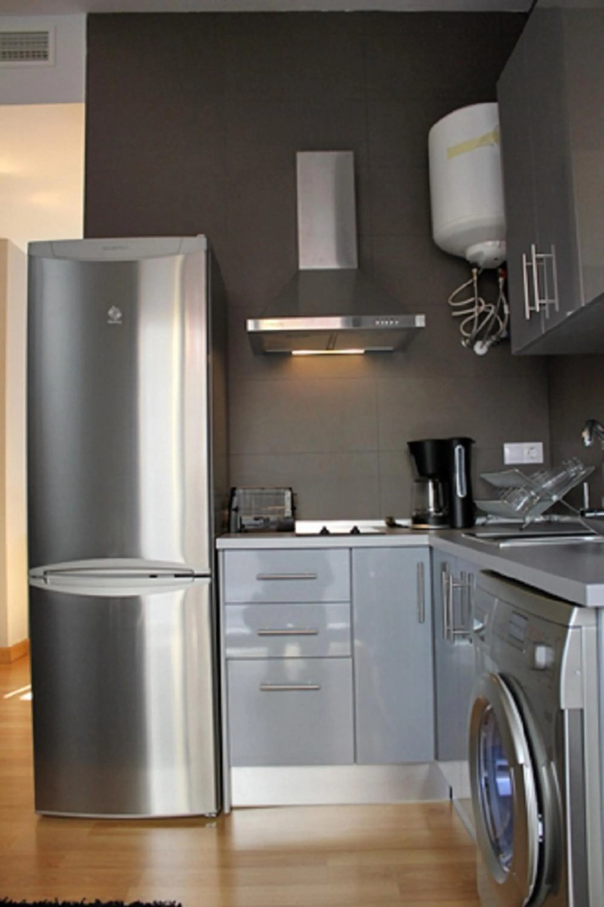 Kitchen or kitchenette in Apartamentos San Pablo