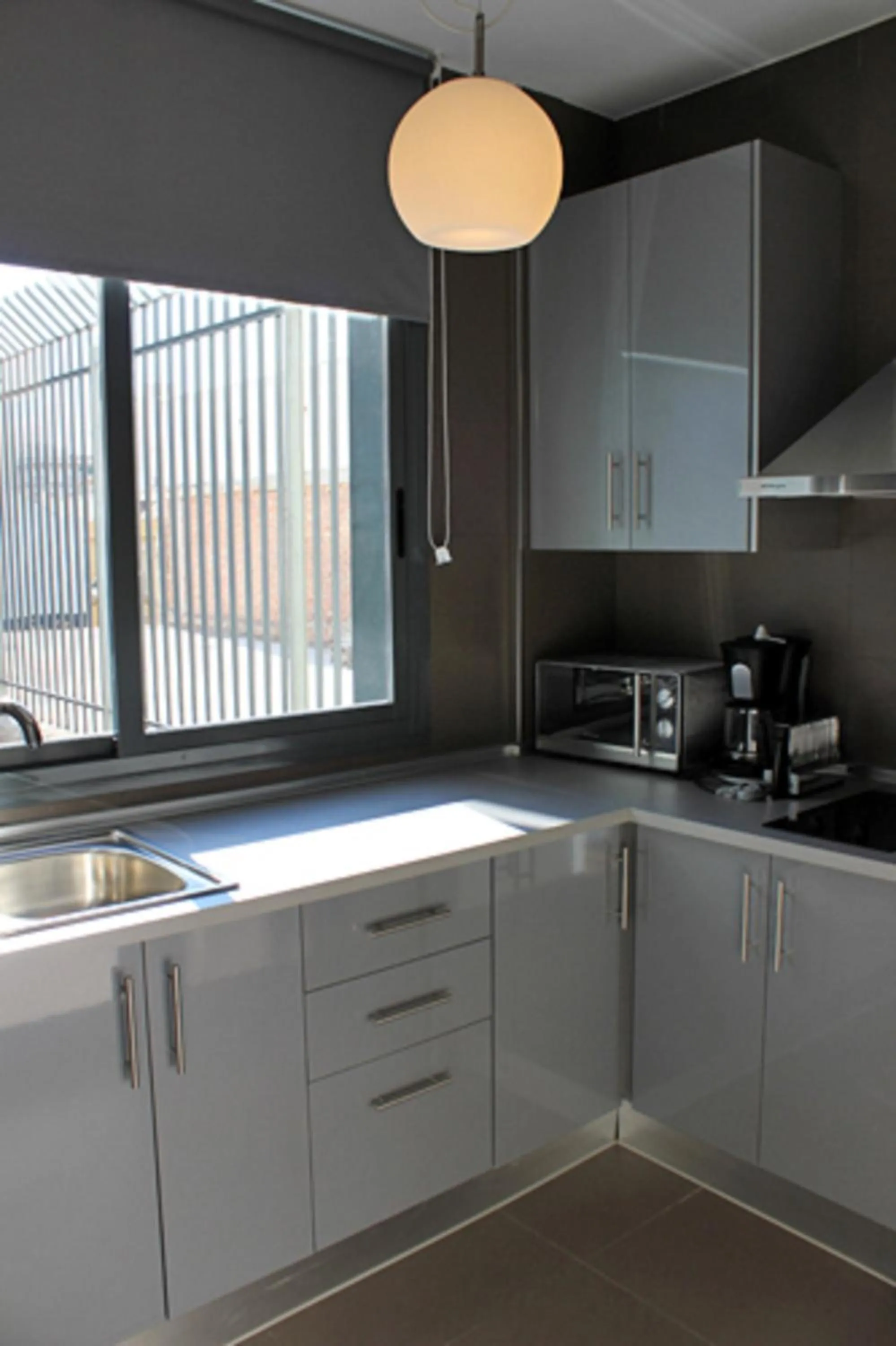 Kitchen or kitchenette in Apartamentos San Pablo