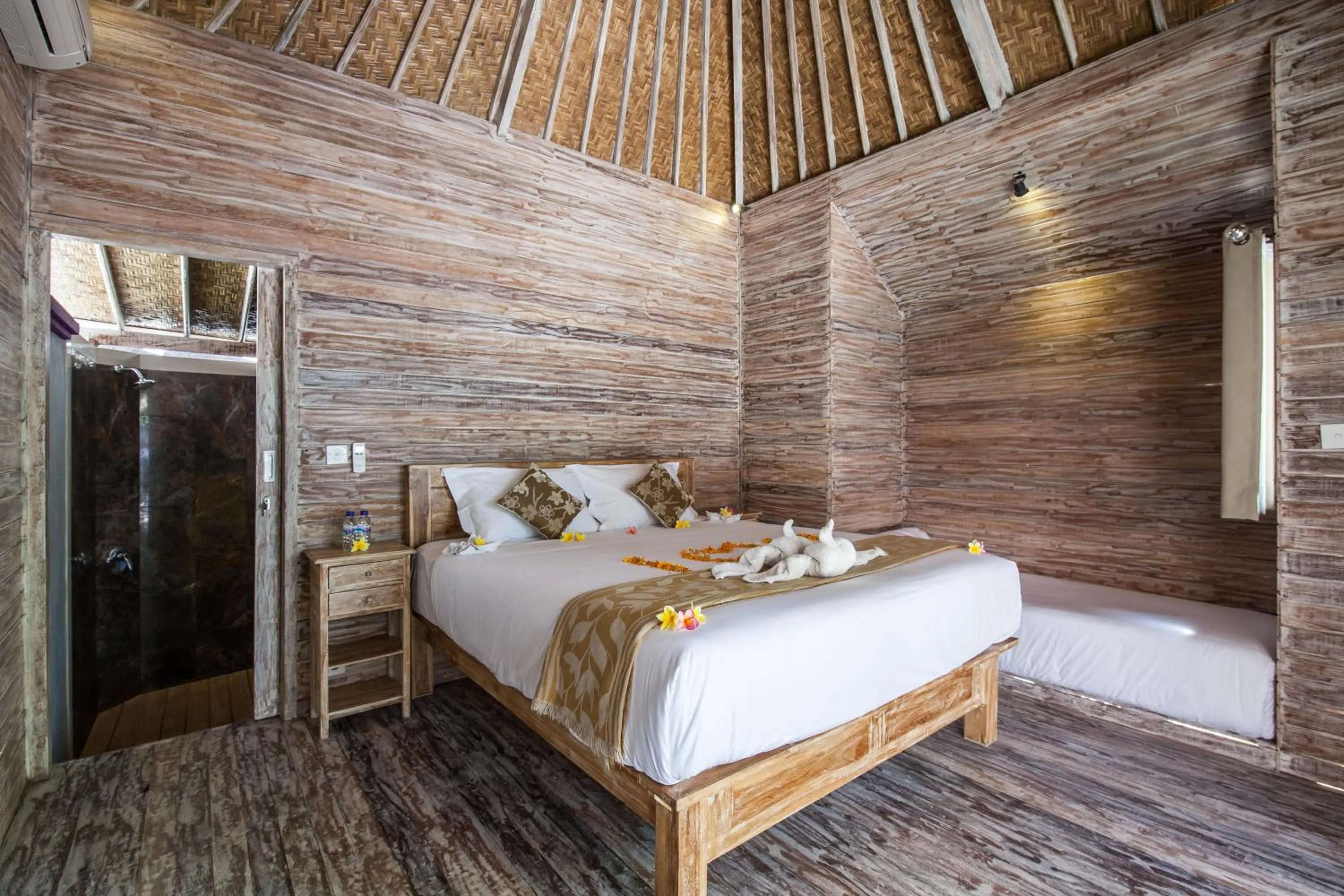 Bed in The Nichos Bungalows And Villas