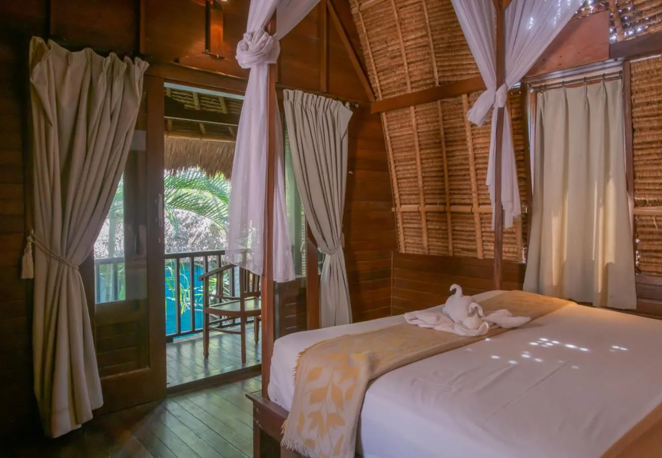 Bedroom in The Nichos Bungalows And Villas